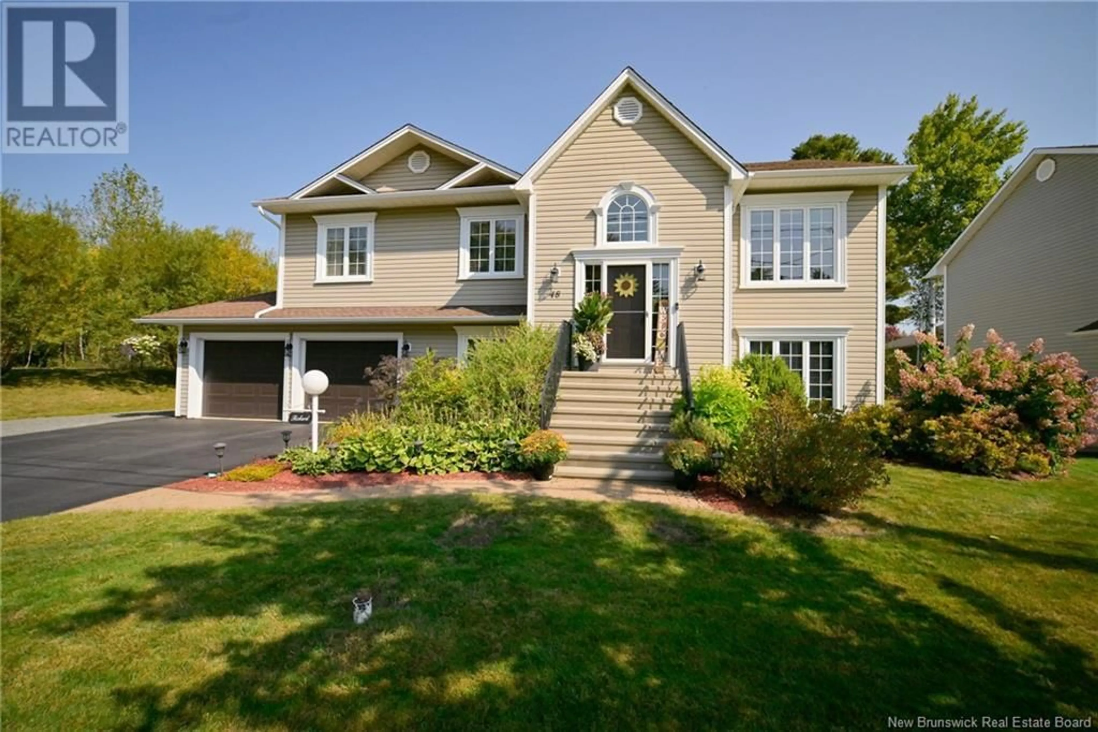 Home with vinyl exterior material, street for 48 PETERS DRIVE, Fredericton New Brunswick E3G0L2