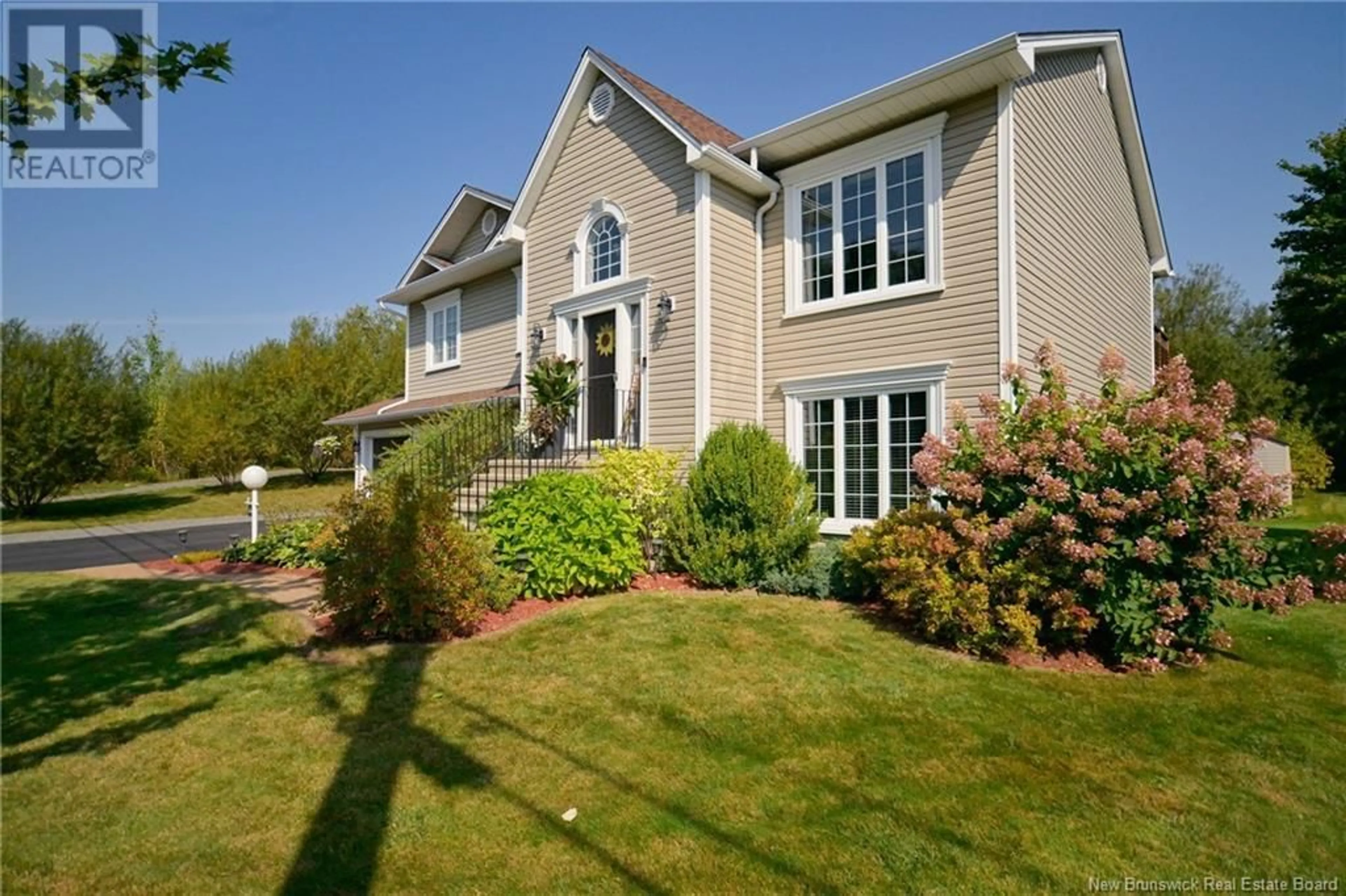 Home with vinyl exterior material, street for 48 PETERS DRIVE, Fredericton New Brunswick E3G0L2