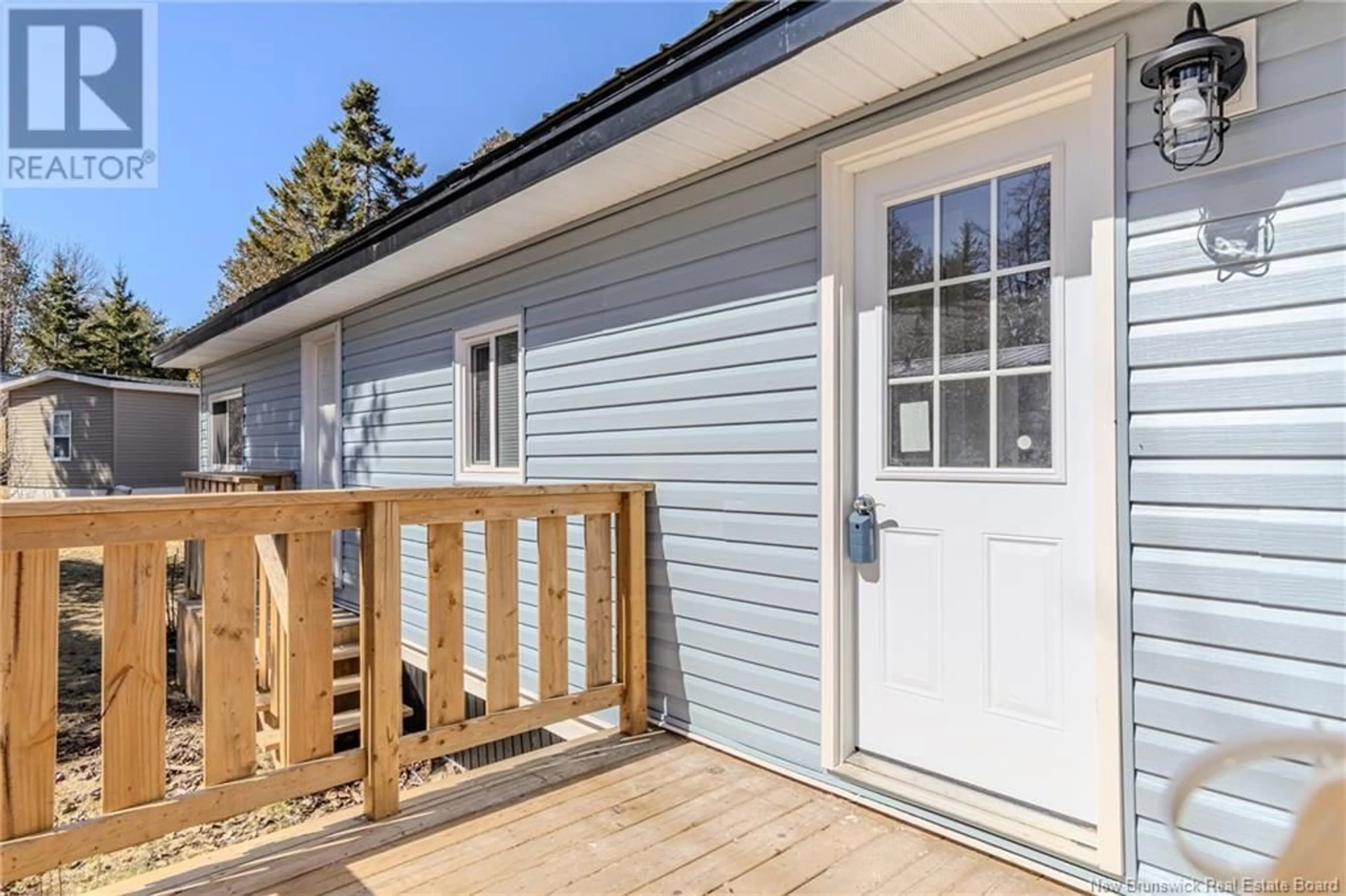 Home with vinyl exterior material, street for 107 ASH LANE, Quispamsis New Brunswick E2G1T3
