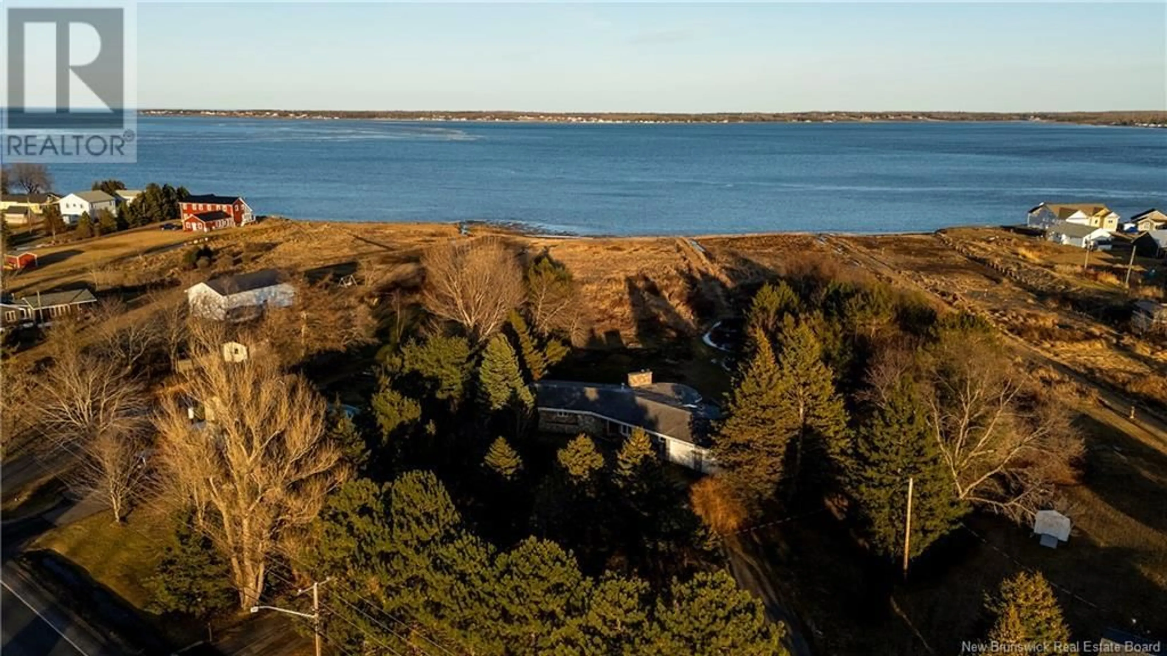 A pic from outside/outdoor area/front of a property/back of a property/a pic from drone, water/lake/river/ocean view for 1878 ROUTE 535, Cocagne New Brunswick E4R3H5