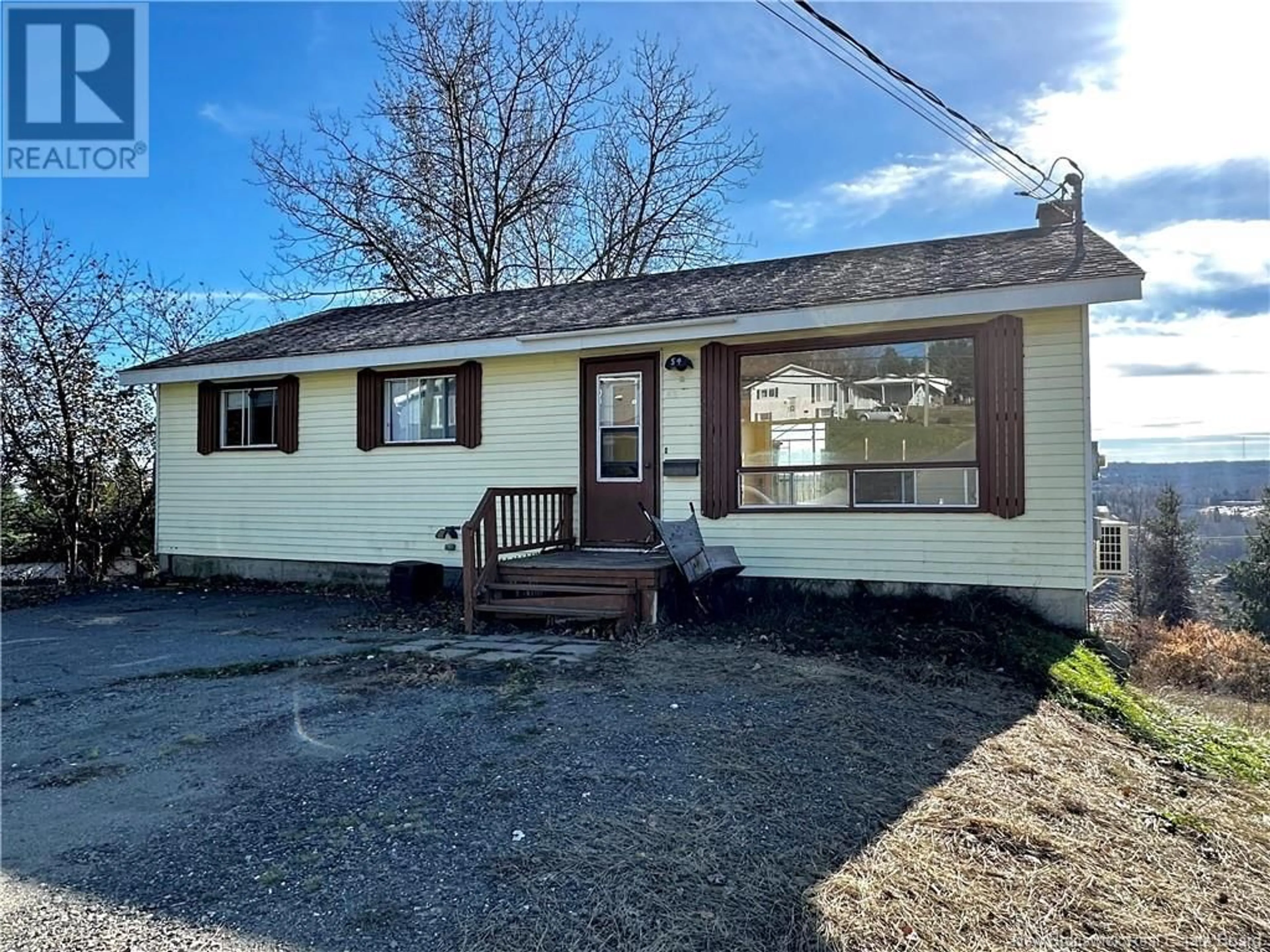 Home with vinyl exterior material, street for 54 CORMIER STREET, Edmundston New Brunswick E3V2E7