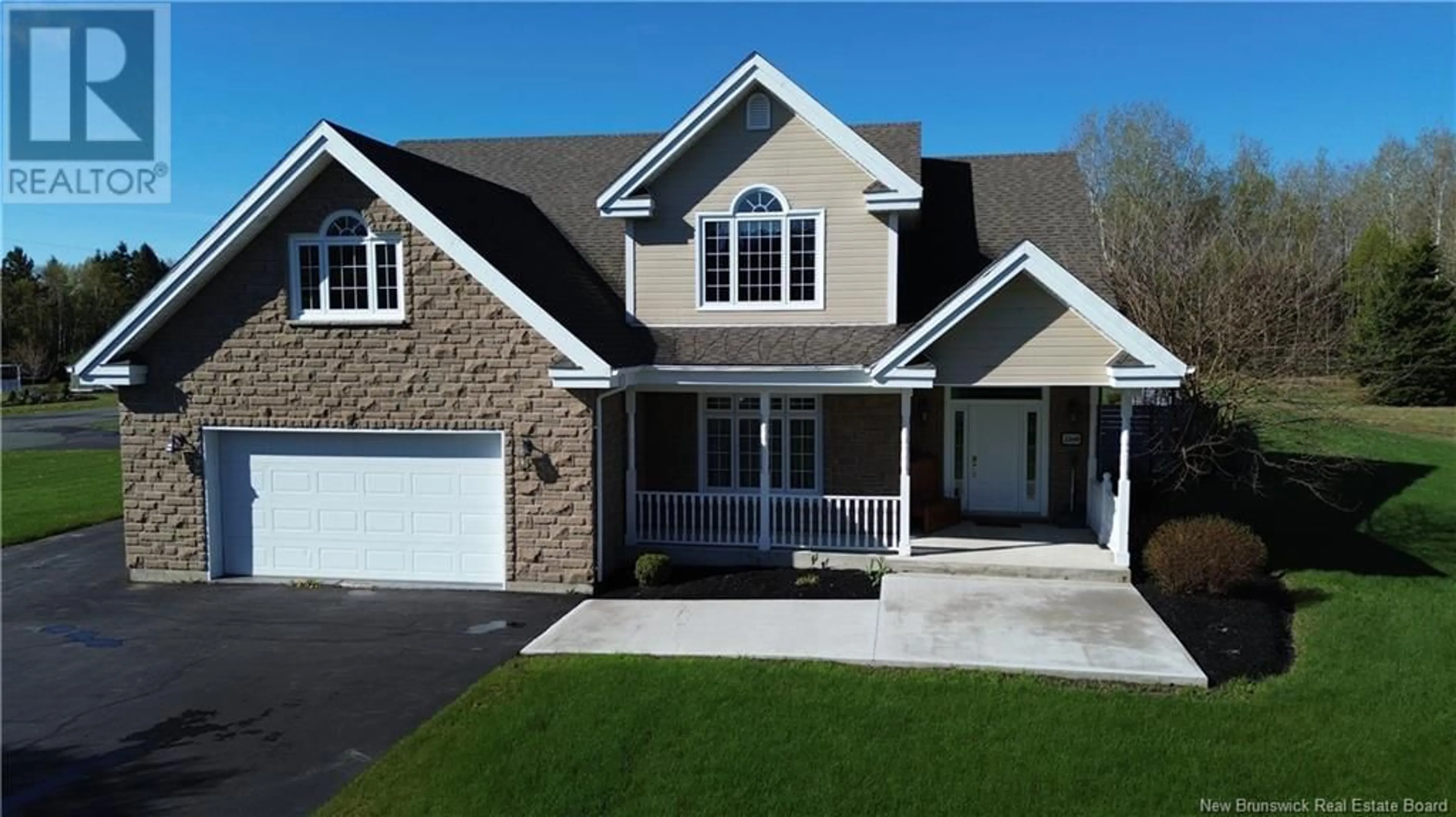 Home with vinyl exterior material, street for 1240 CHRISTIE STREET, Beresford New Brunswick E8K1A4