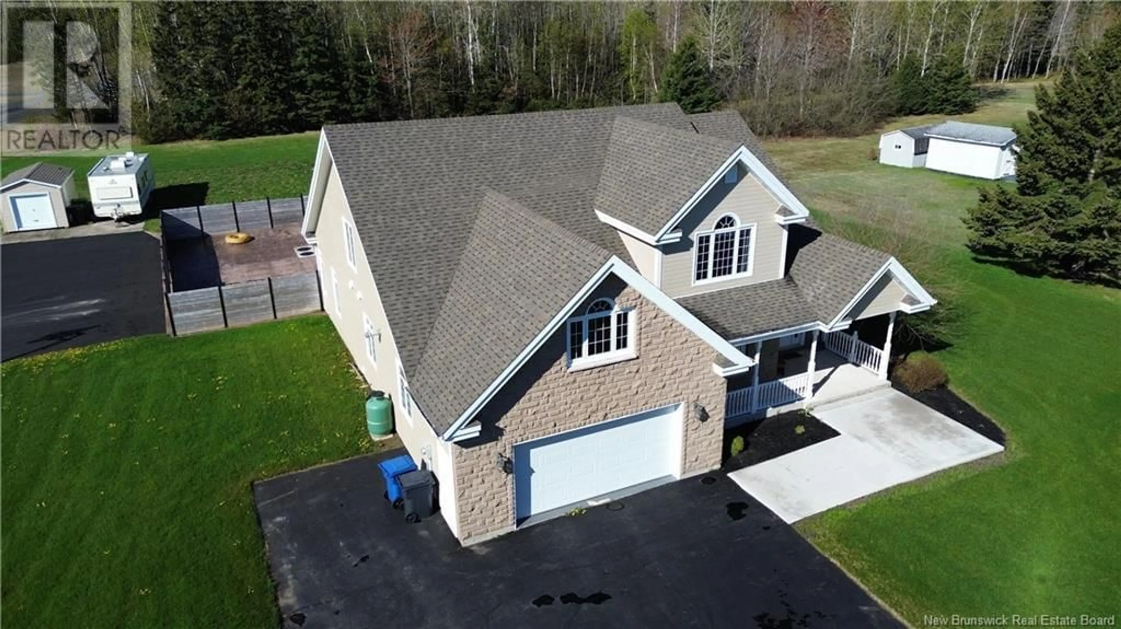 A pic from outside/outdoor area/front of a property/back of a property/a pic from drone, street for 1240 CHRISTIE STREET, Beresford New Brunswick E8K1A4