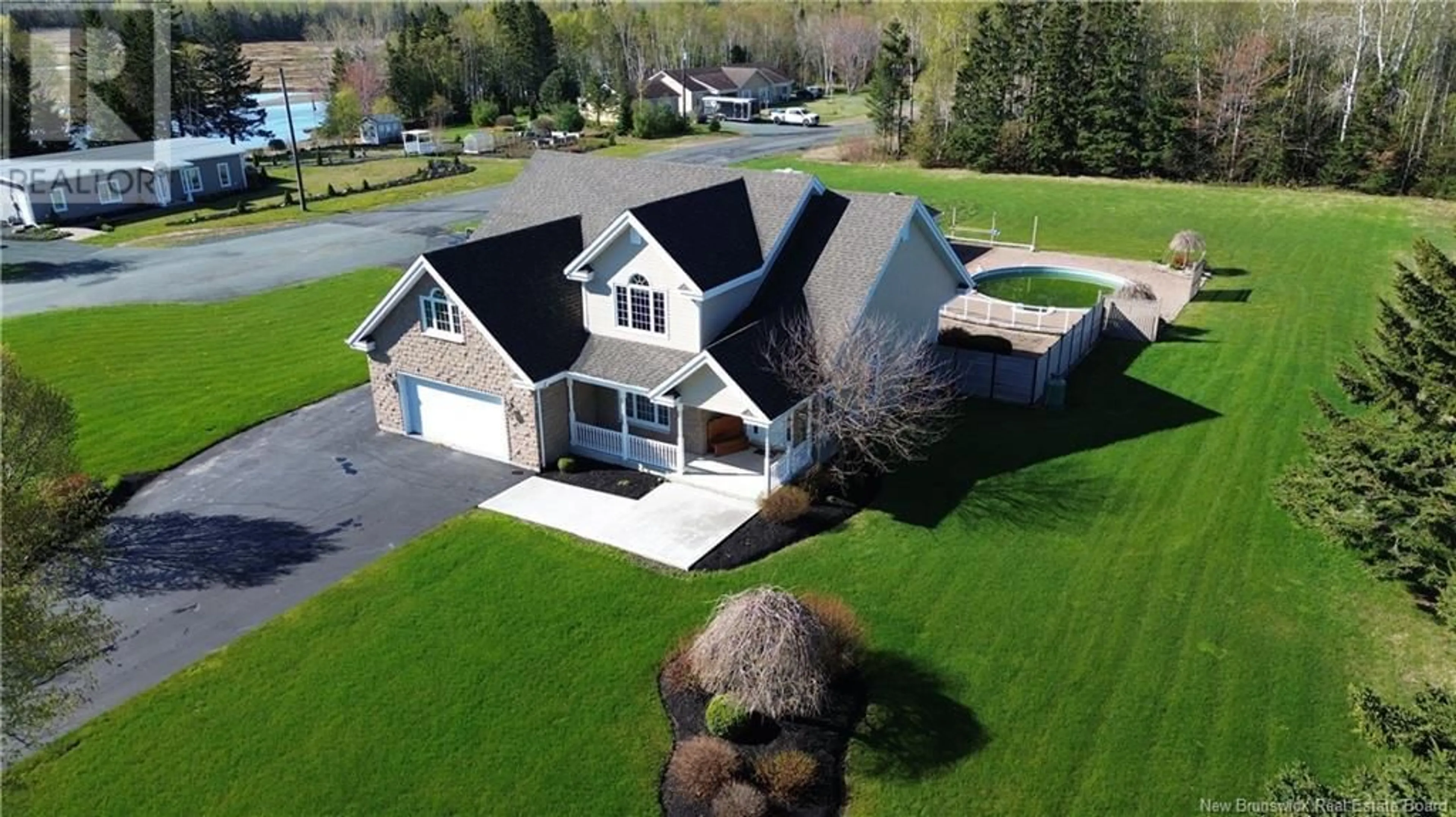 A pic from outside/outdoor area/front of a property/back of a property/a pic from drone, street for 1240 CHRISTIE STREET, Beresford New Brunswick E8K1A4