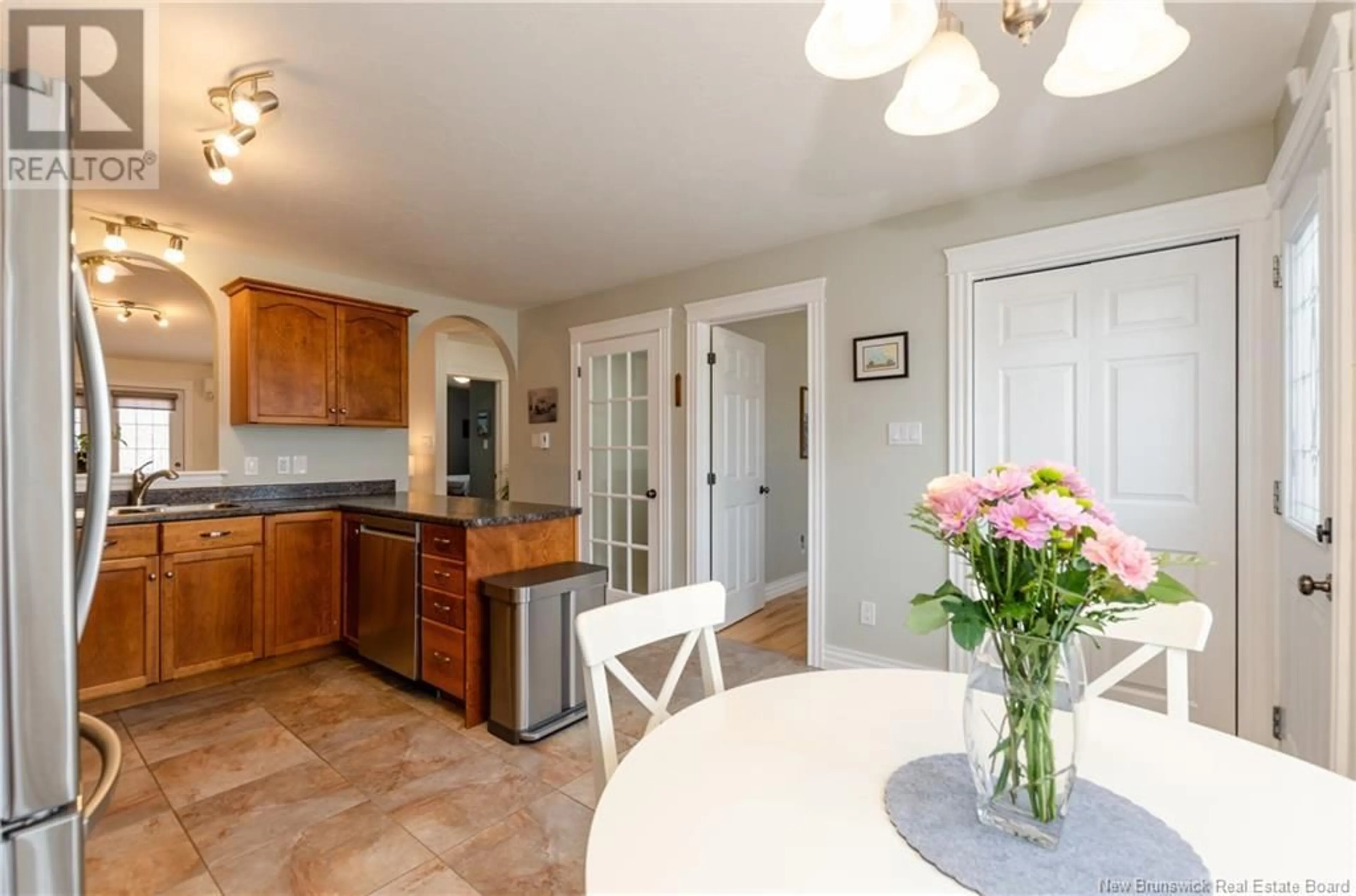 Open concept kitchen, ceramic/tile floor for 131 KETTLE CREEK COURT, Riverview New Brunswick E1B0C1
