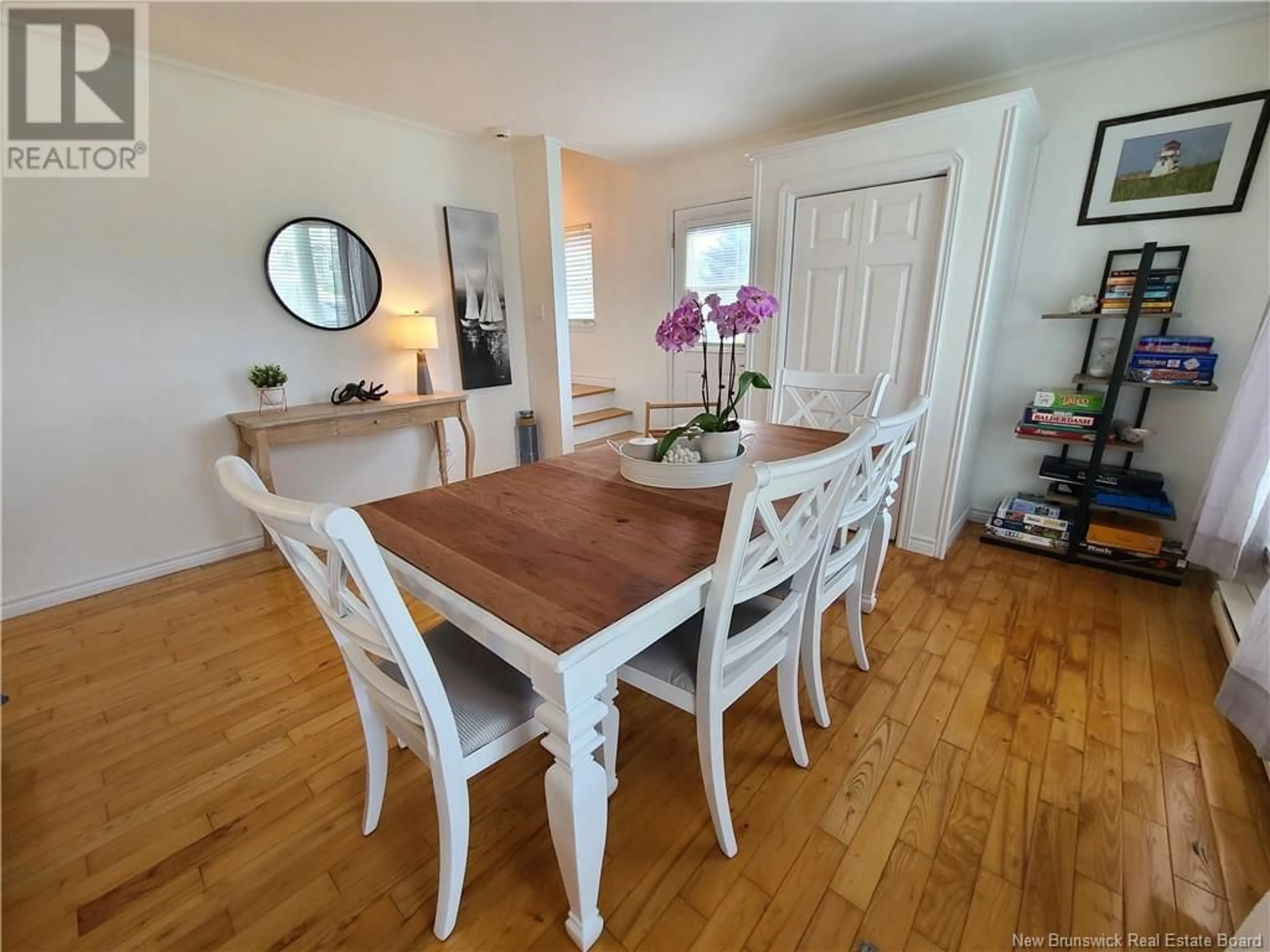 Dining room, wood/laminate floor for 36 Baybreeze Lane, Grand-Barachois New Brunswick E4P6X2