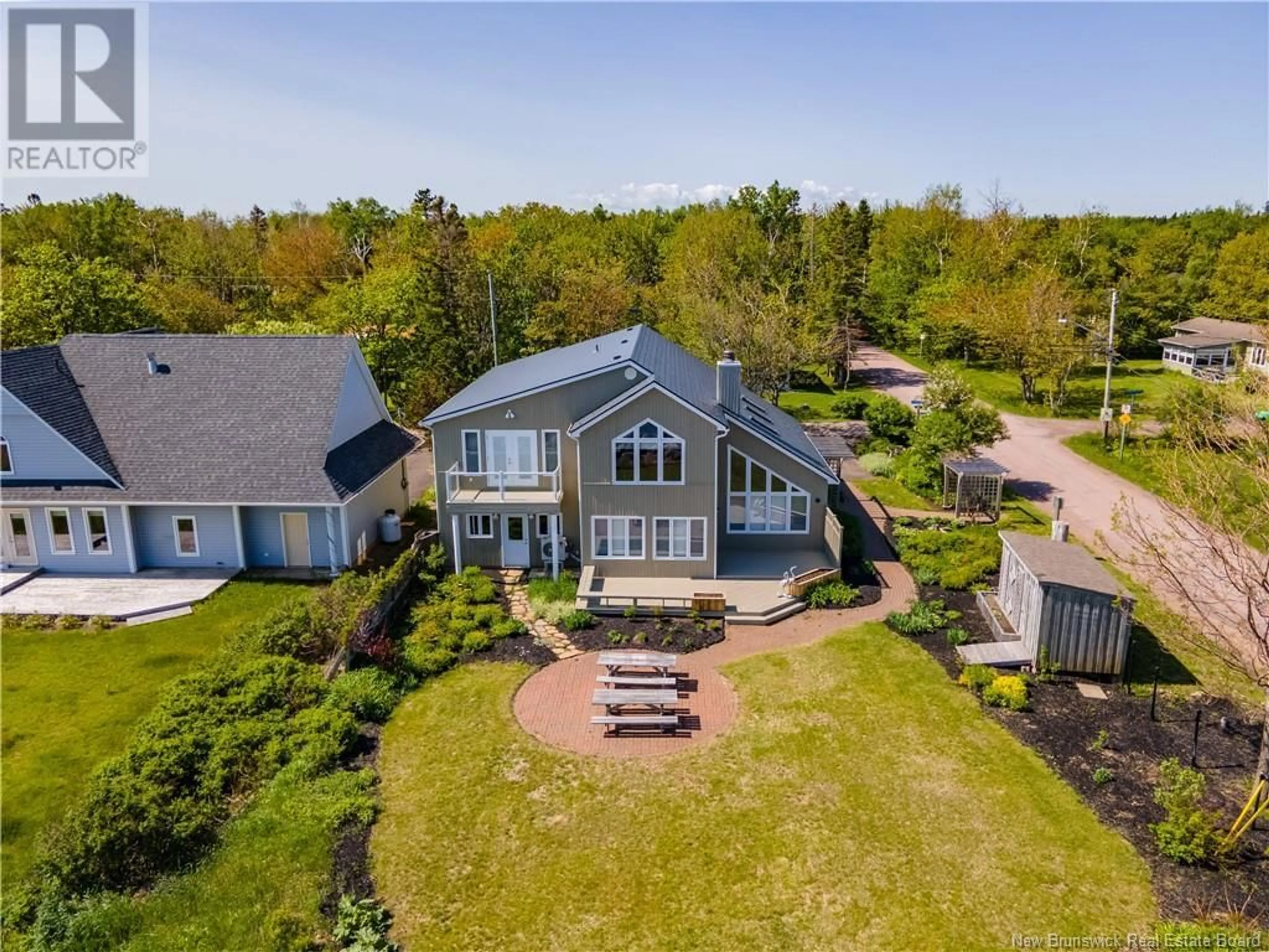 A pic from outside/outdoor area/front of a property/back of a property/a pic from drone, water/lake/river/ocean view for 89 DU BOIS JOLI AVENUE, Grand-Barachois New Brunswick E4P6W4