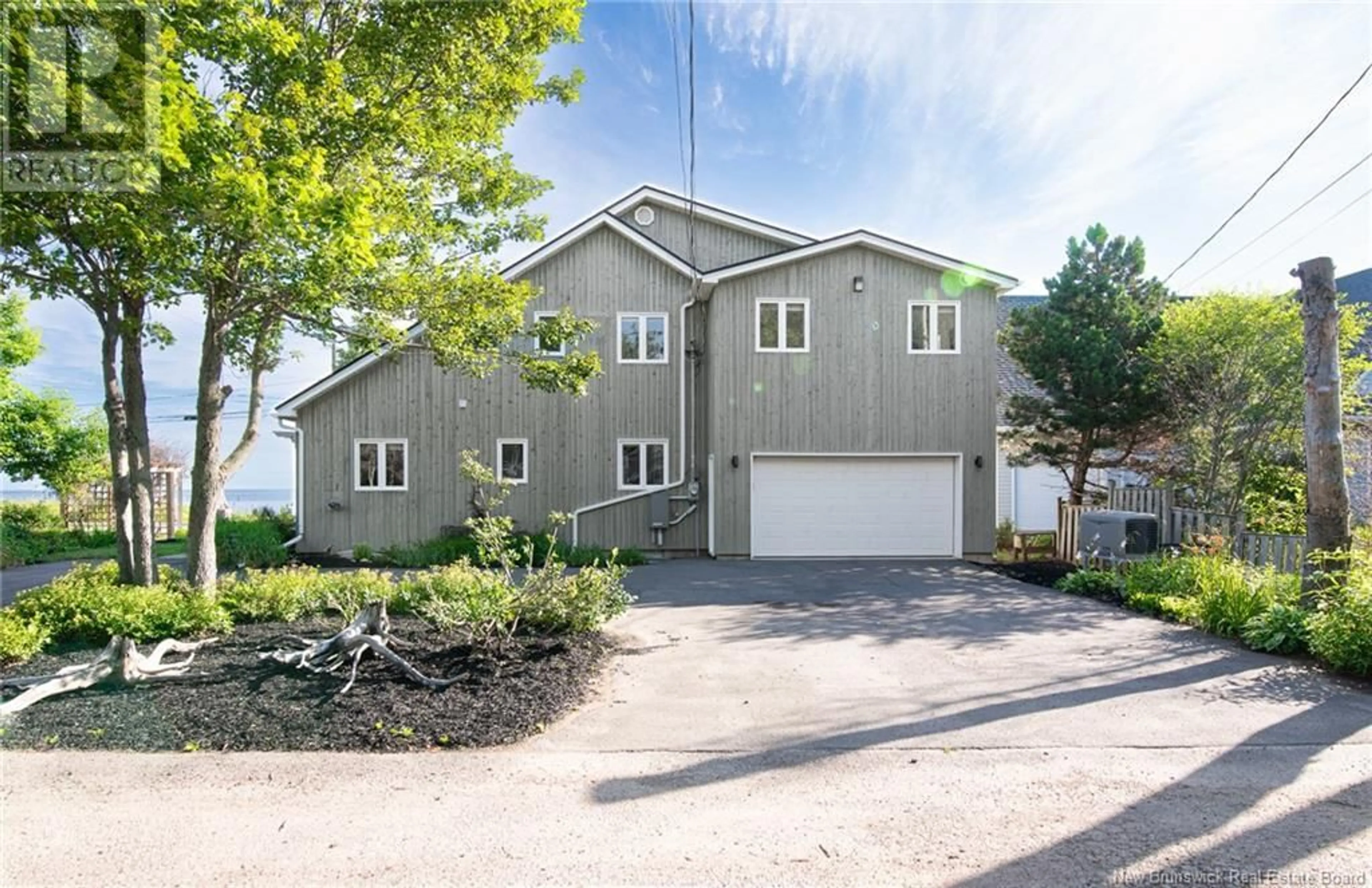 Home with vinyl exterior material, street for 89 DU BOIS JOLI AVENUE, Grand-Barachois New Brunswick E4P6W4