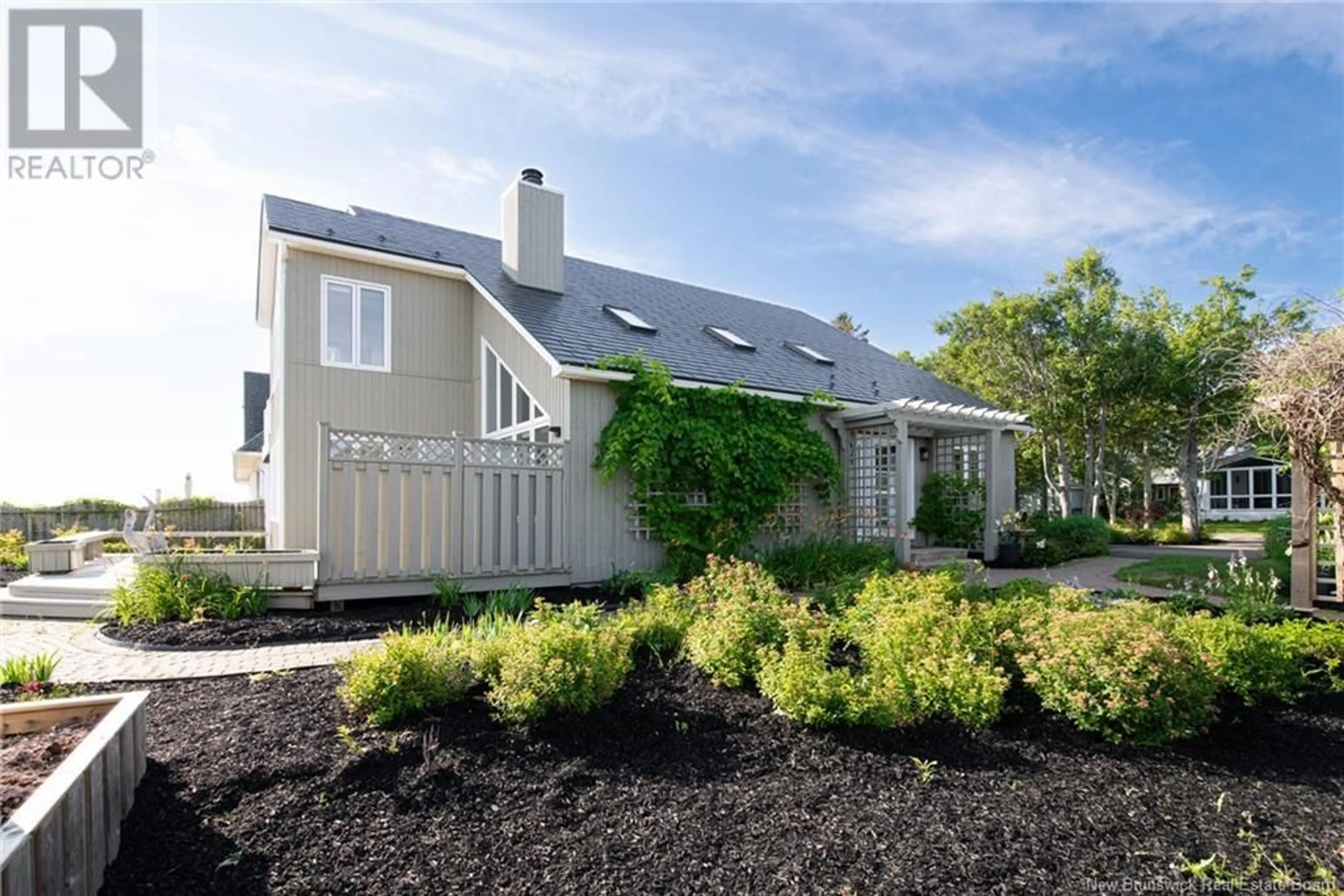 Home with vinyl exterior material, street for 89 DU BOIS JOLI AVENUE, Grand-Barachois New Brunswick E4P6W4