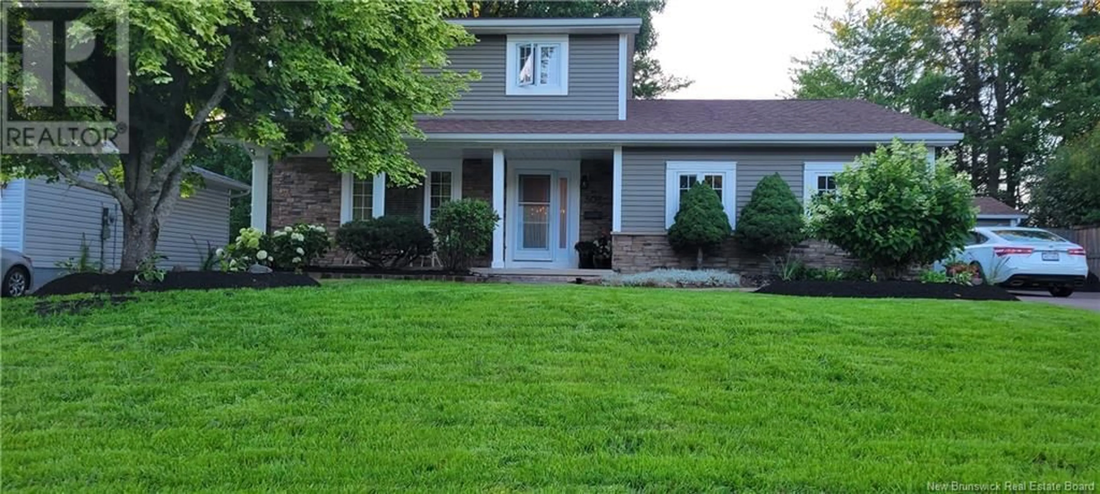 Home with vinyl exterior material, street for 508 ISABELLE STREET, Dieppe New Brunswick E1A6L9