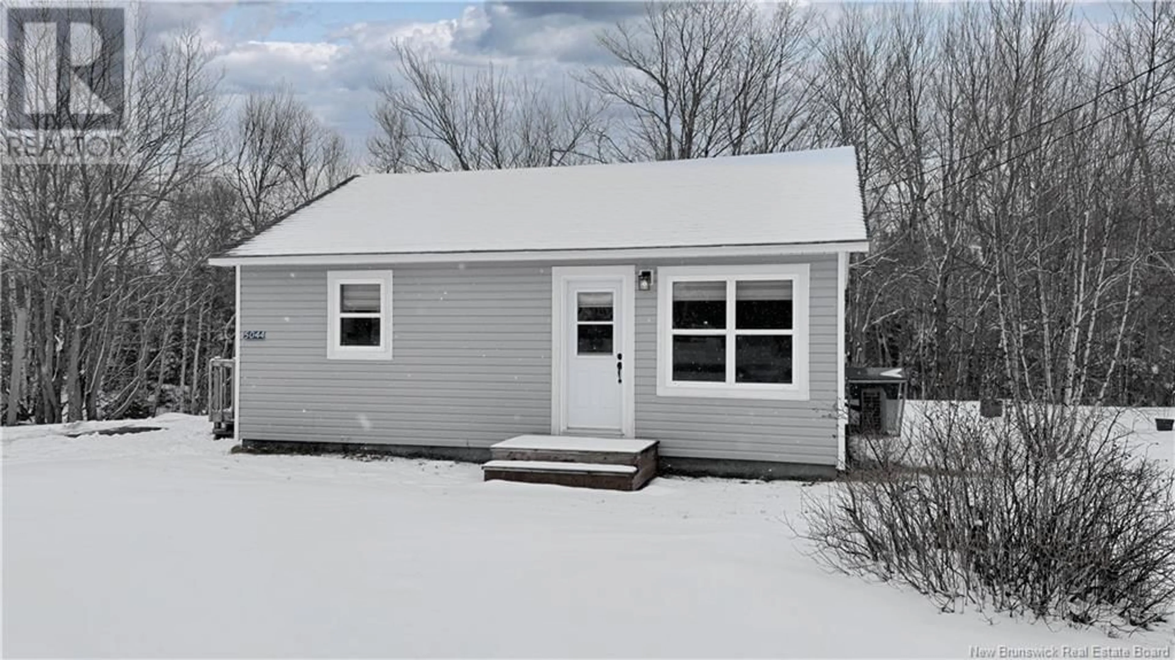 Home with vinyl exterior material, street for 5044 11 ROUTE, Brantville New Brunswick E9H1N1