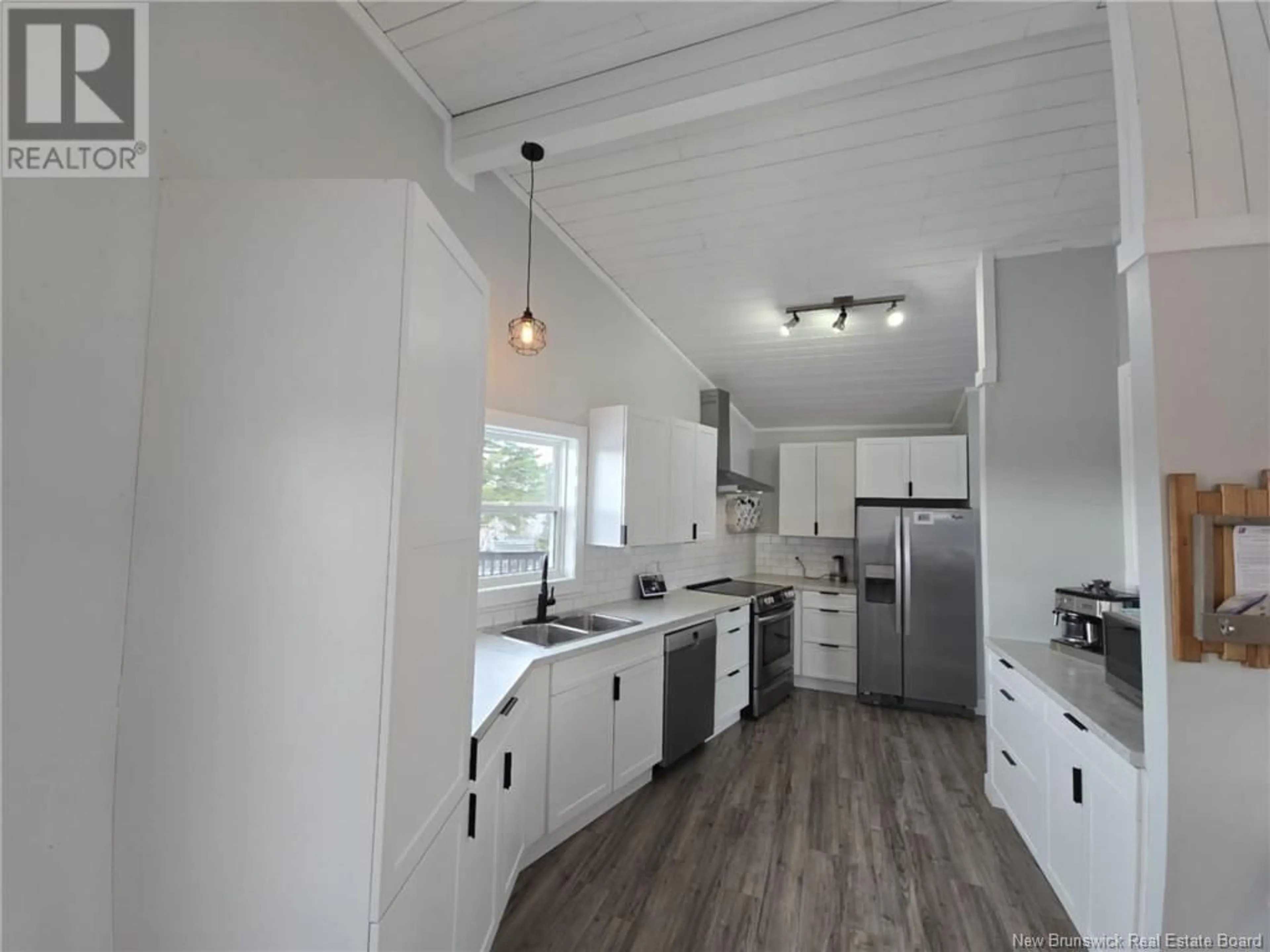 Open concept kitchen, wood/laminate floor for 131 KIERSTEAD DRIVE, Miramichi New Brunswick E1V6R9