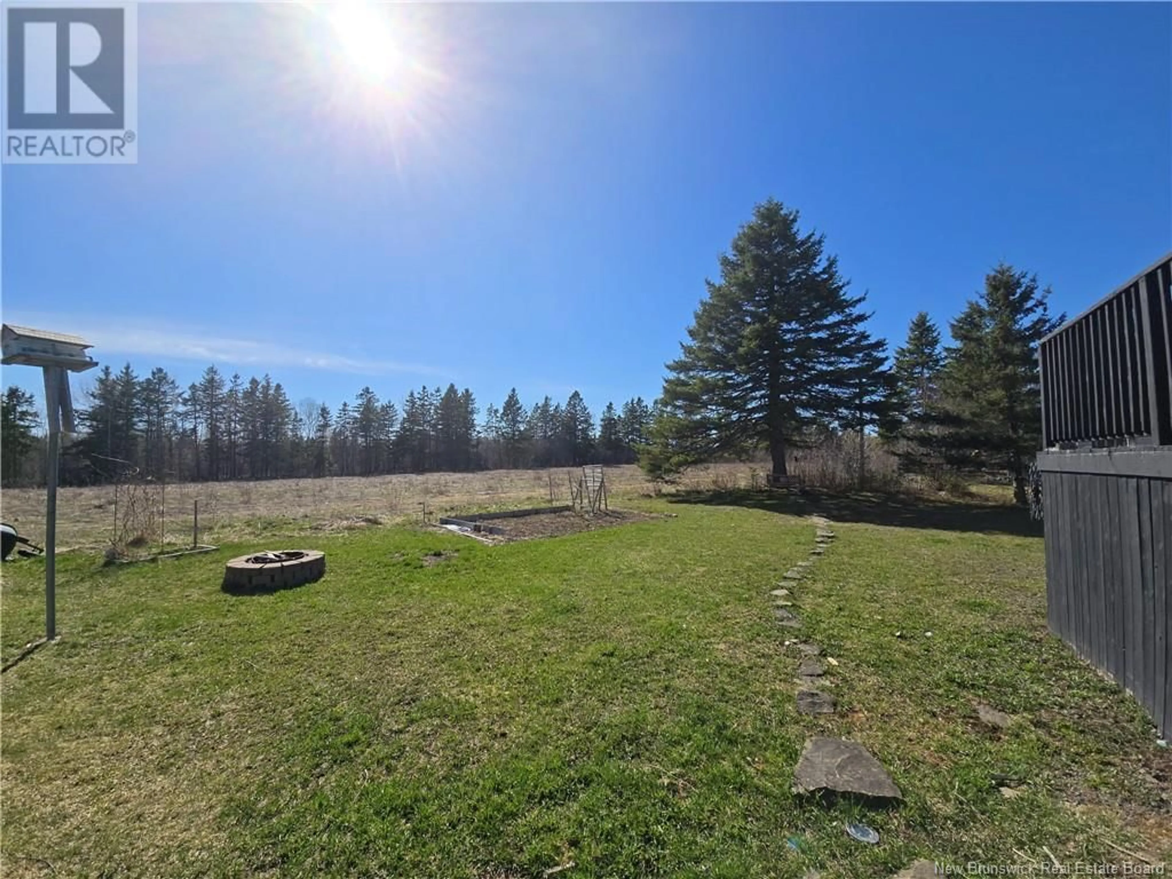 A pic from outside/outdoor area/front of a property/back of a property/a pic from drone, forest/trees view for 131 KIERSTEAD DRIVE, Miramichi New Brunswick E1V6R9