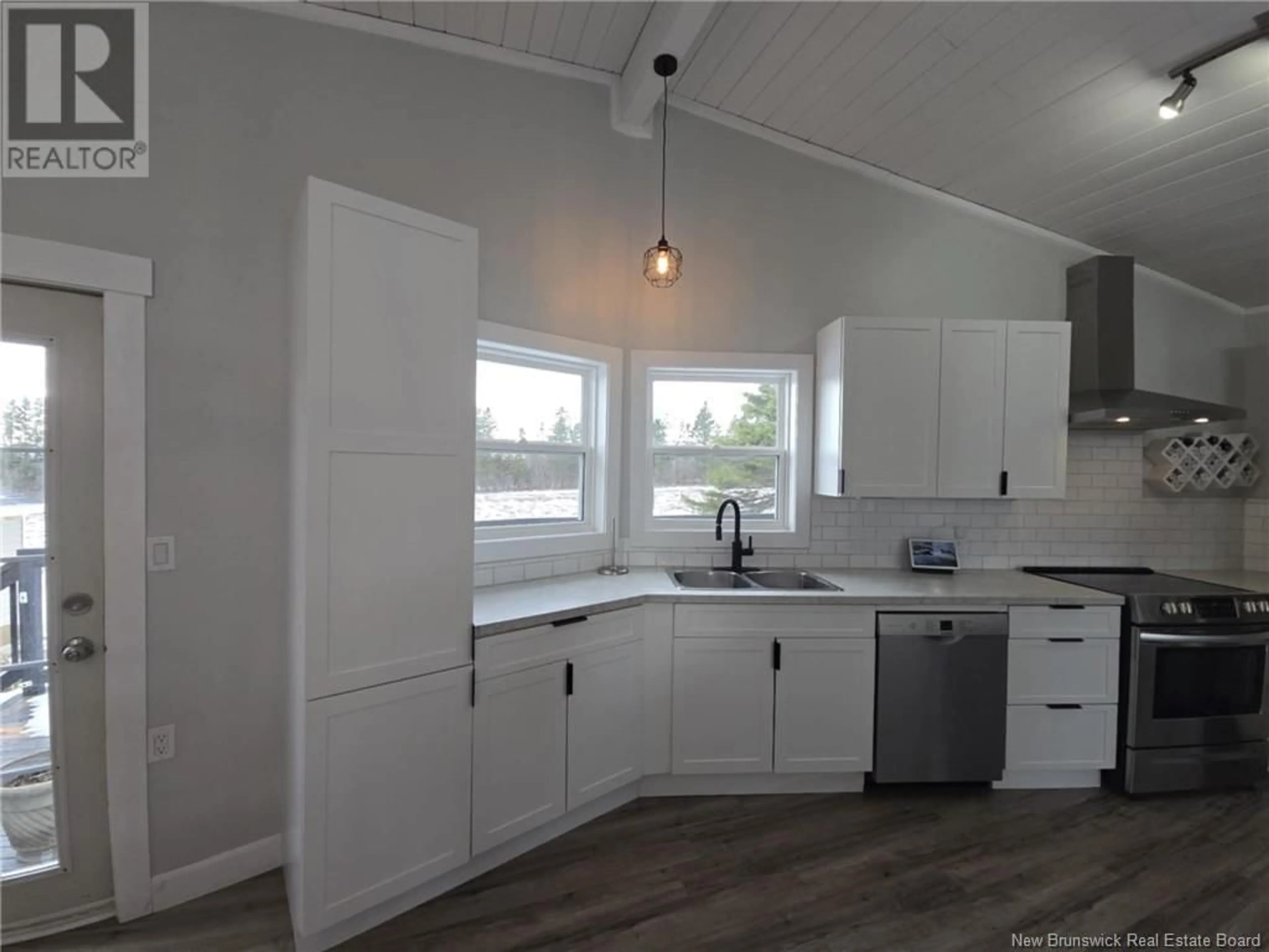 Open concept kitchen, wood/laminate floor for 131 KIERSTEAD DRIVE, Miramichi New Brunswick E1V6R9