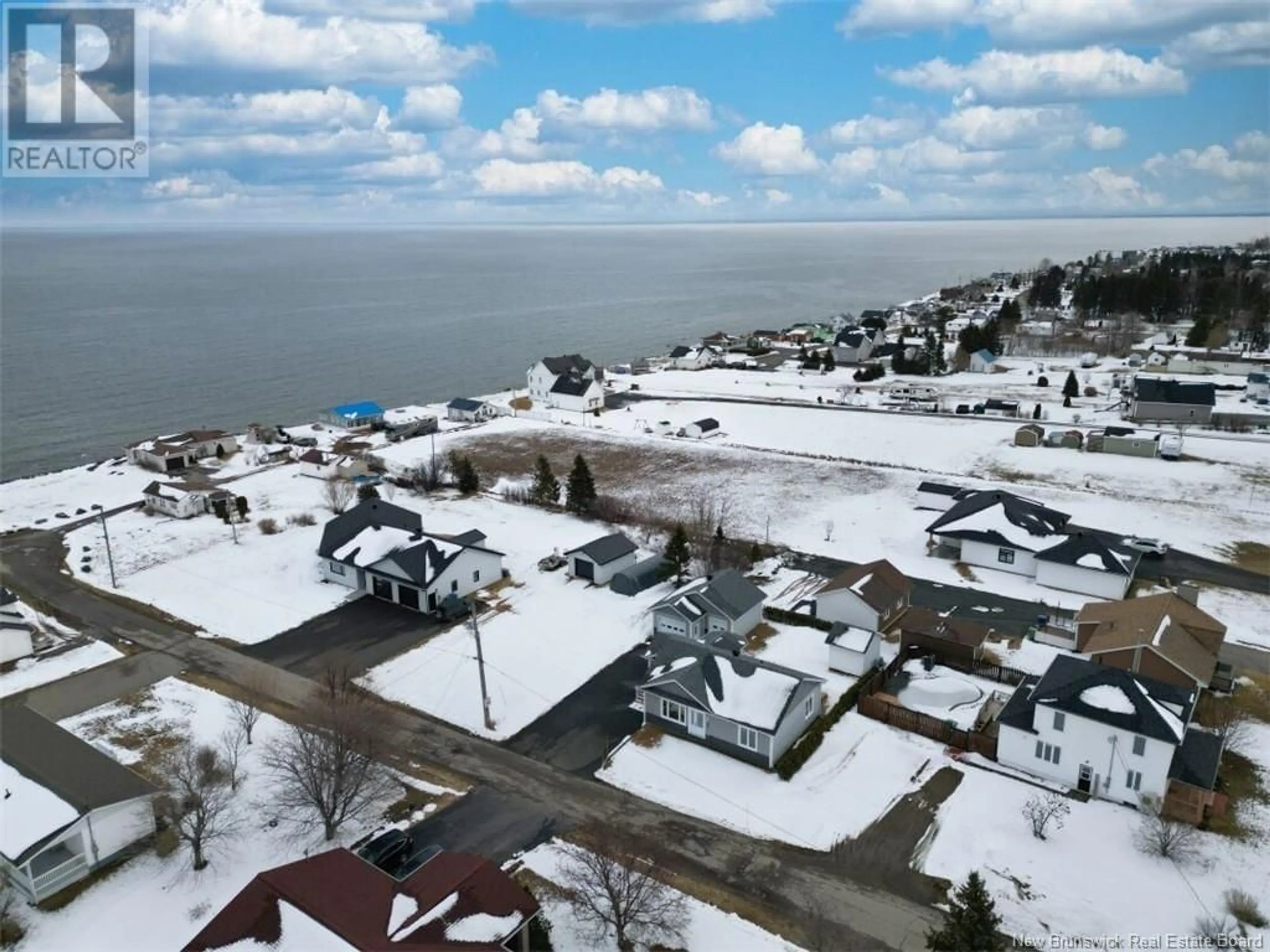 A pic from outside/outdoor area/front of a property/back of a property/a pic from drone, water/lake/river/ocean view for 65 GRANT, Petit-Rocher New Brunswick E8J1G5