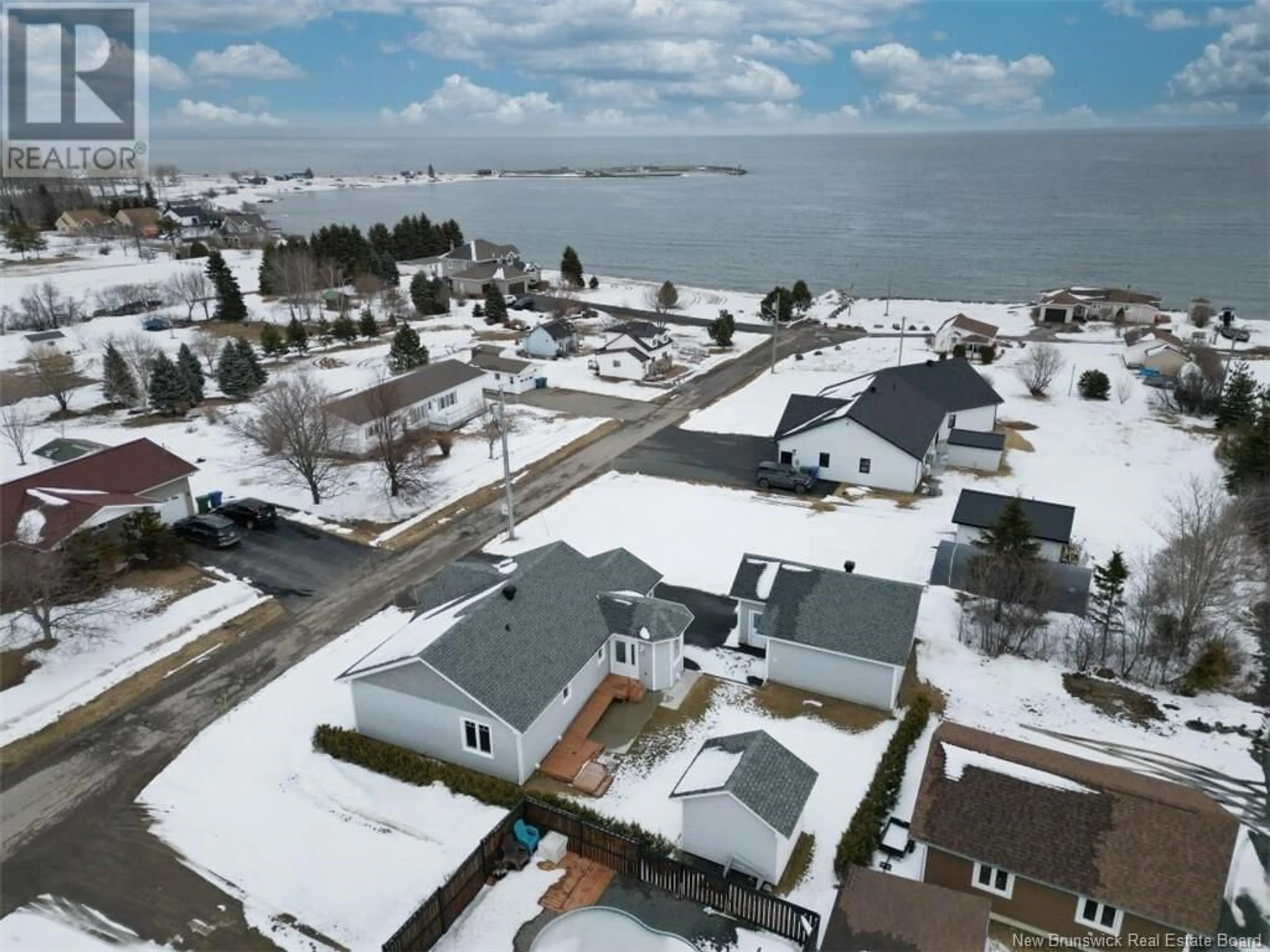 A pic from outside/outdoor area/front of a property/back of a property/a pic from drone, water/lake/river/ocean view for 65 GRANT, Petit-Rocher New Brunswick E8J1G5