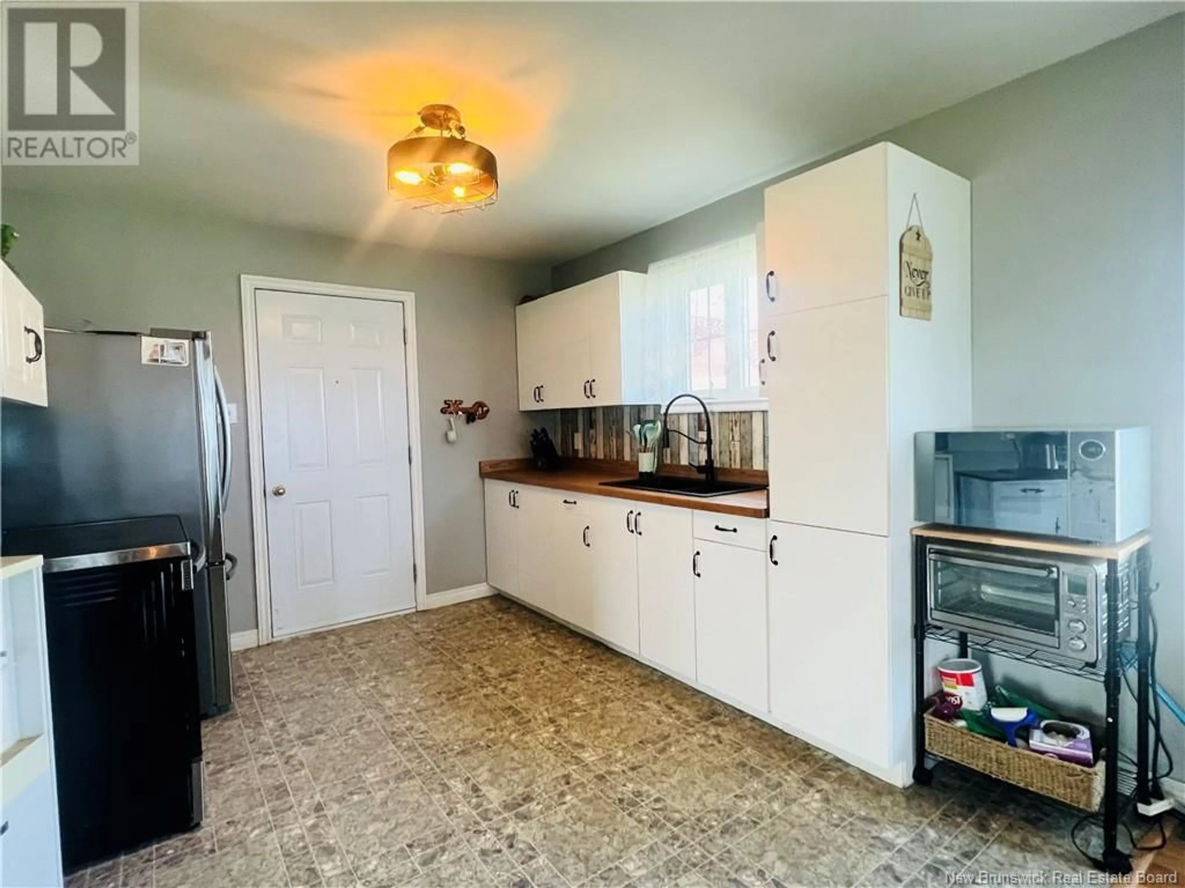 Standard kitchen, ceramic/tile floor for 49 OCEAN WALK, Salmon Beach New Brunswick E2A6C7