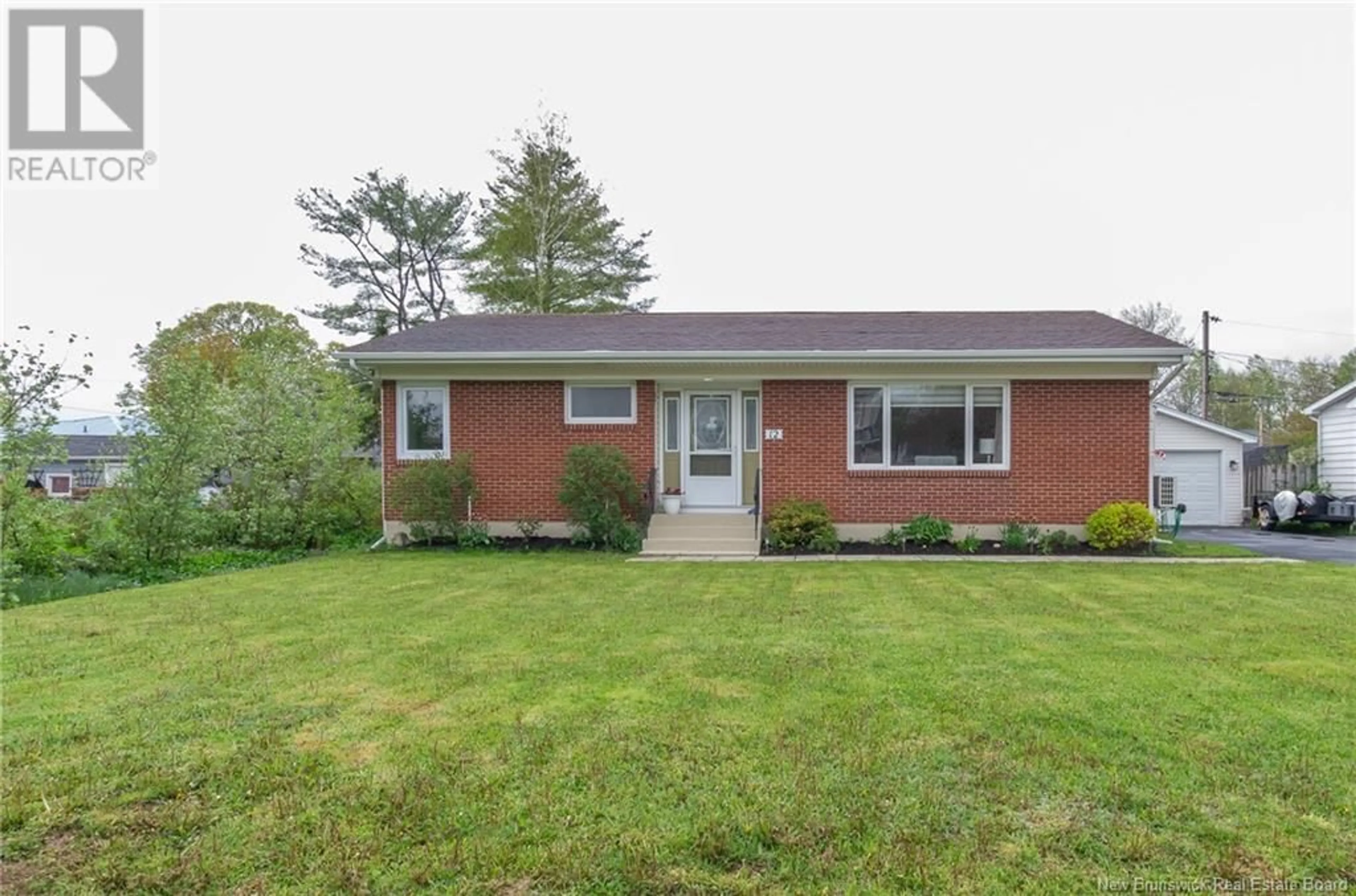 Home with brick exterior material, street for 12 GALAXY DRIVE, Moncton New Brunswick E1A4L9