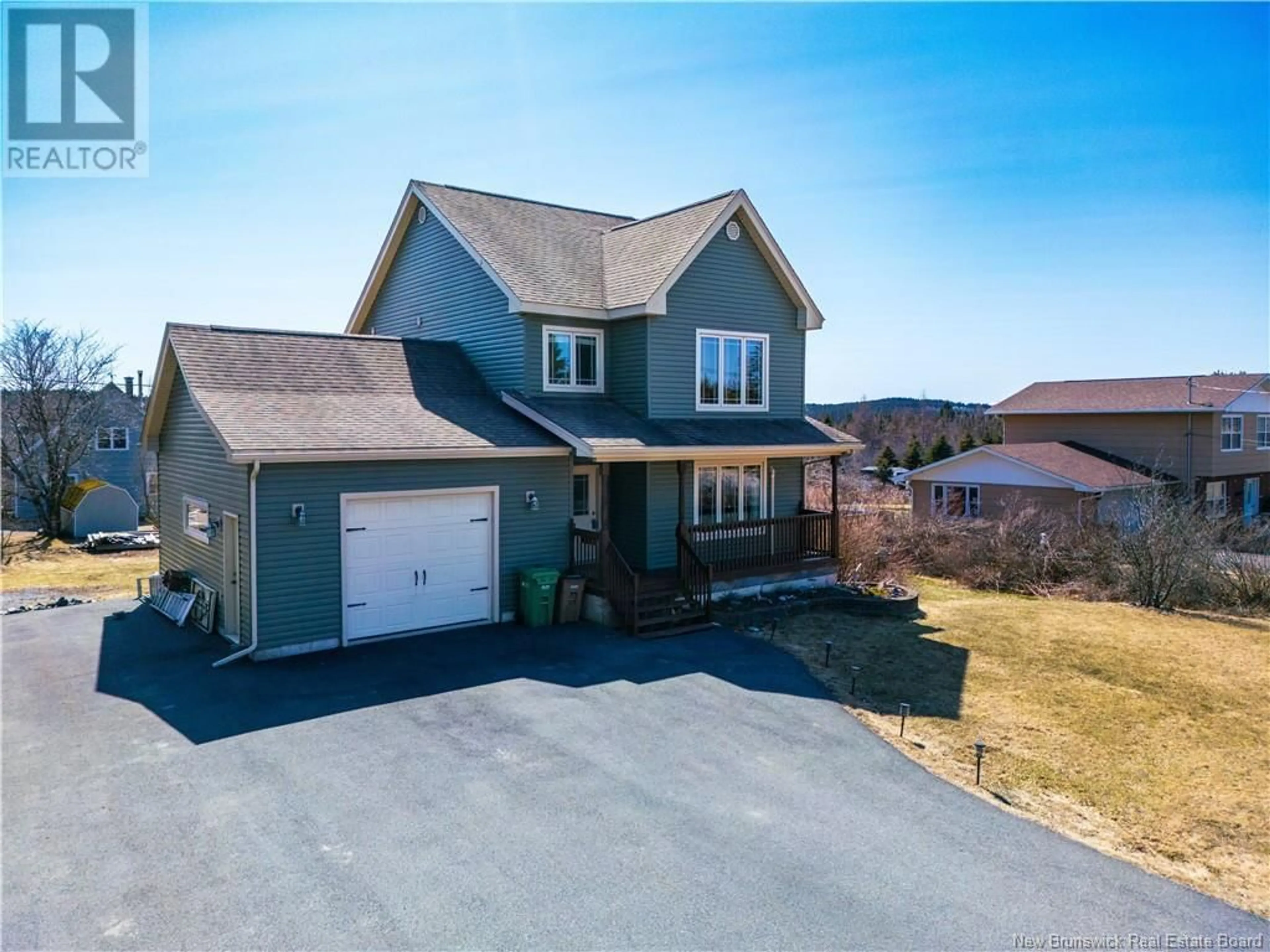 A pic from outside/outdoor area/front of a property/back of a property/a pic from drone, street for 2218 LOCH LOMOND ROAD, Saint John New Brunswick E2N1A2