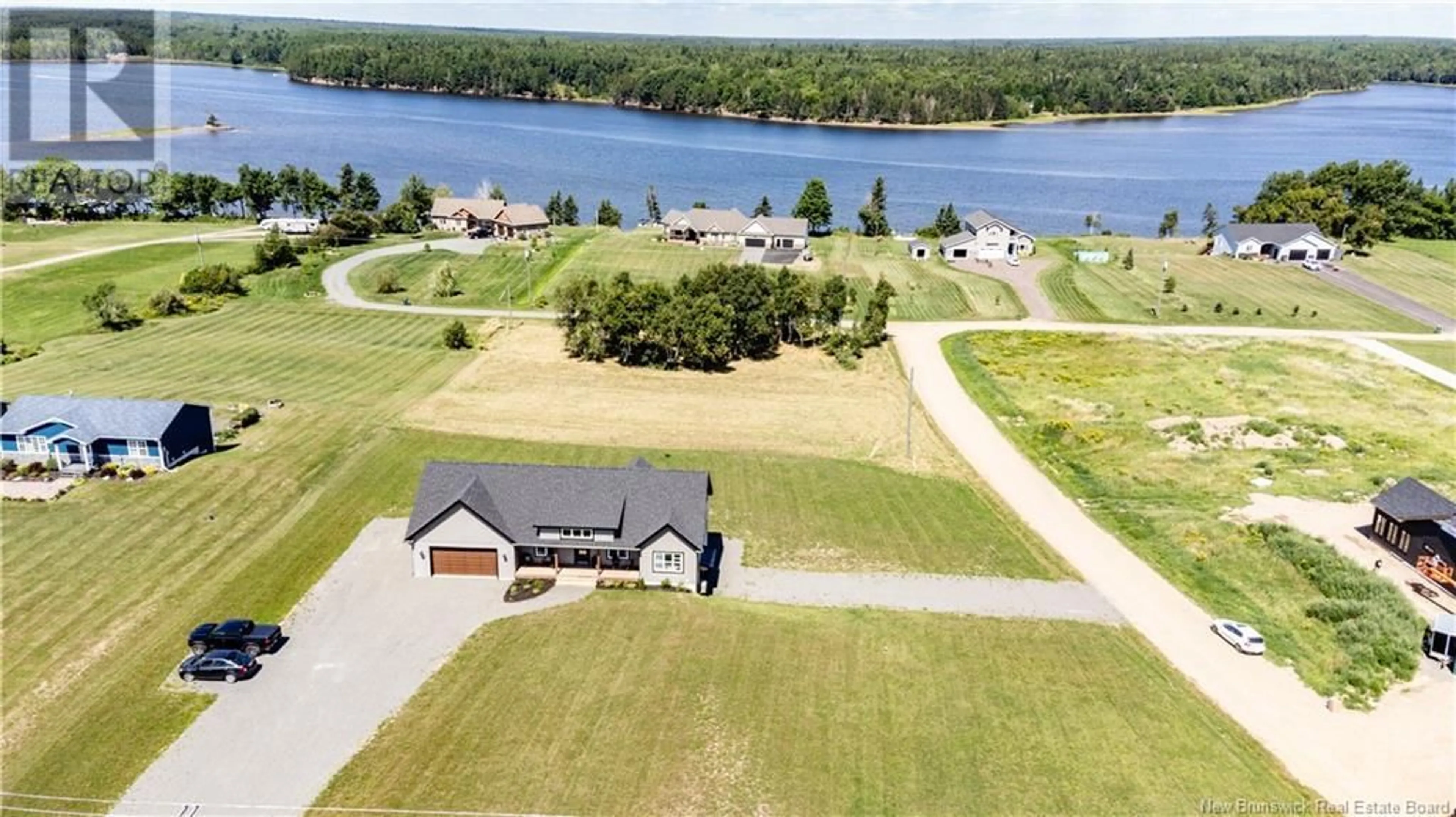 A pic from outside/outdoor area/front of a property/back of a property/a pic from drone, water/lake/river/ocean view for 496 ROUTE 510, Main River New Brunswick E4T1T4