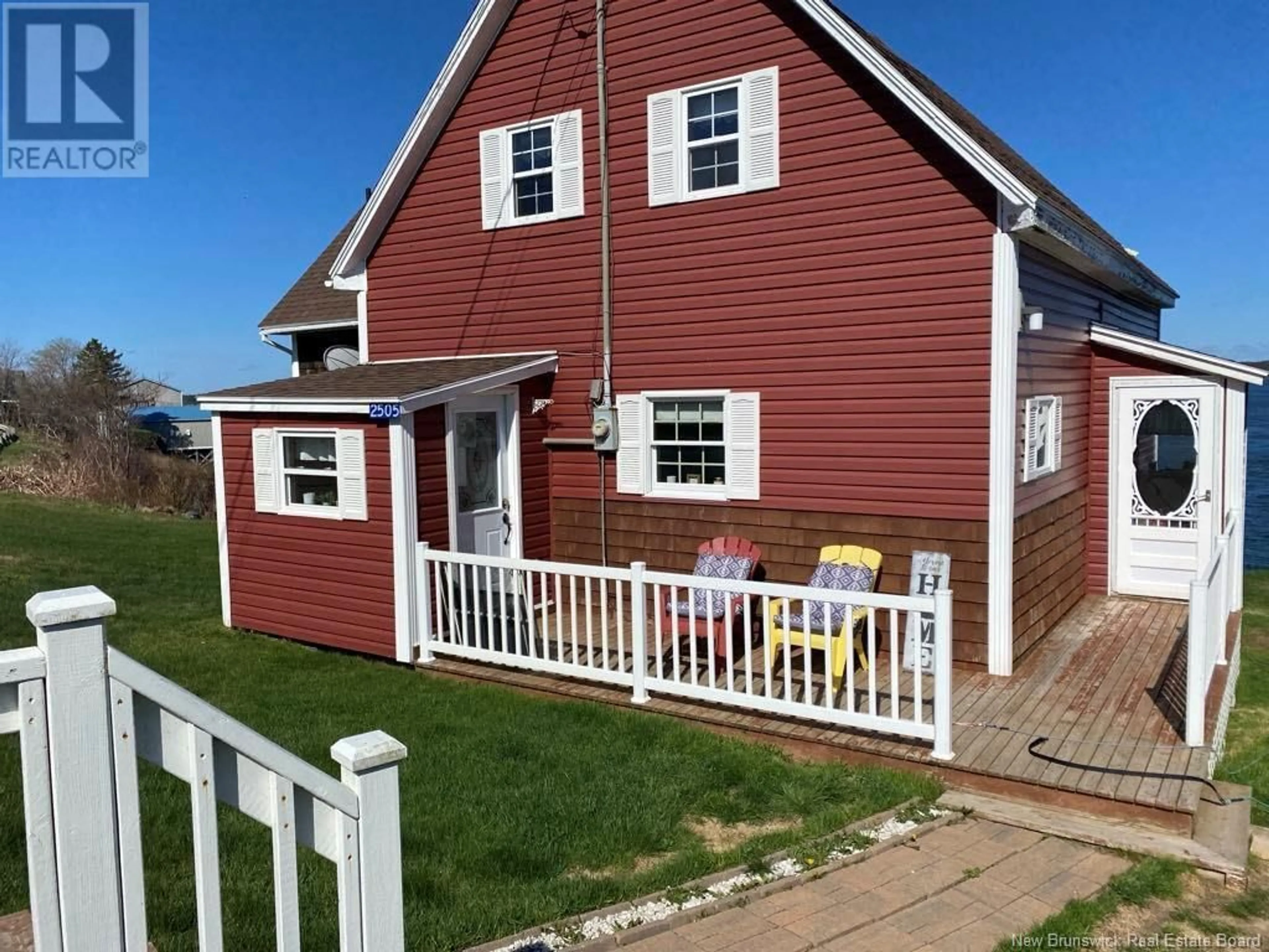 A pic from outside/outdoor area/front of a property/back of a property/a pic from drone, street for 2505 ROUTE 774, Wilsons Beach New Brunswick E5E1K4
