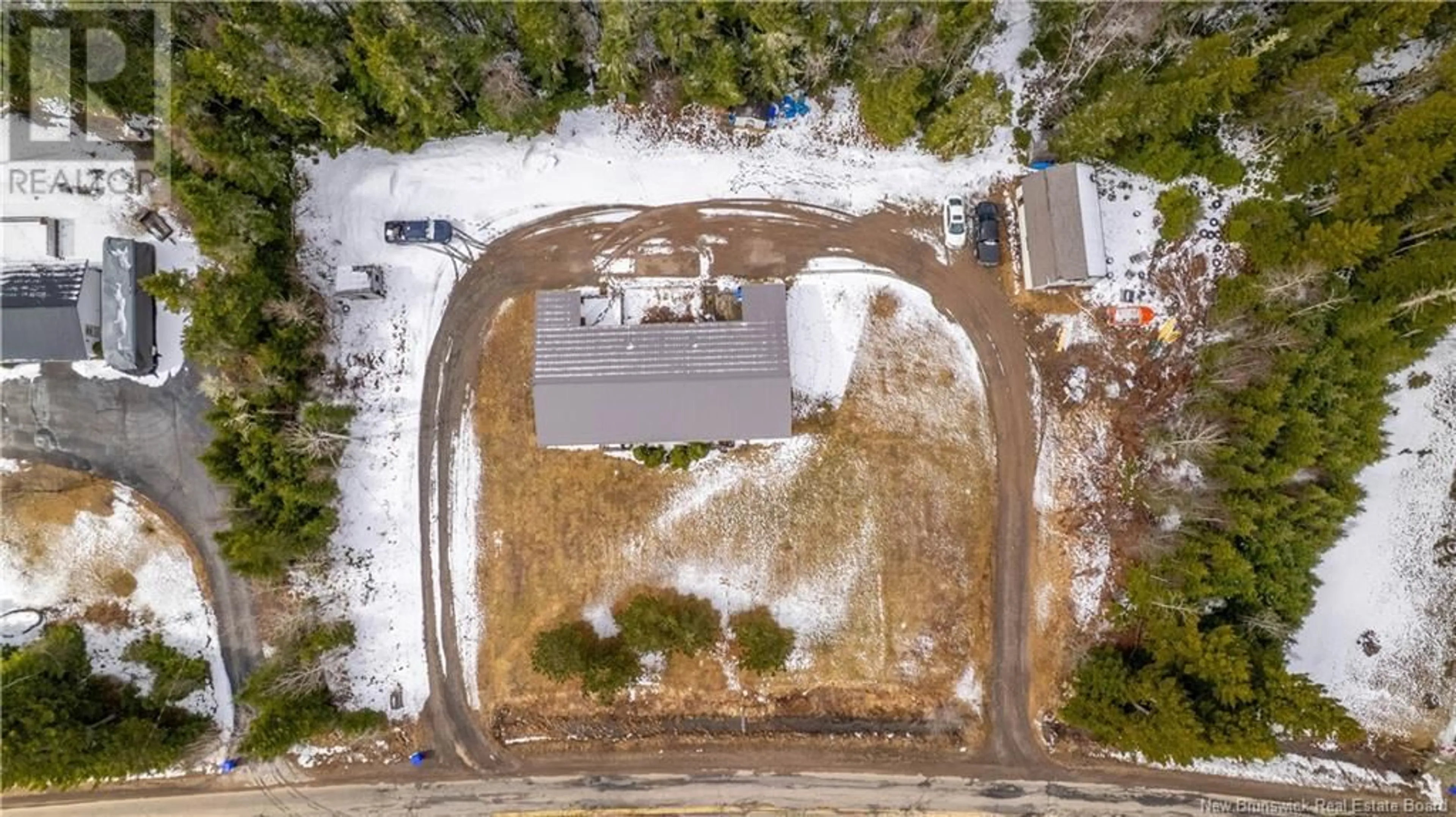 A pic from outside/outdoor area/front of a property/back of a property/a pic from drone, street for 45 FUNDY BAY DRIVE, St George New Brunswick E5C3E3