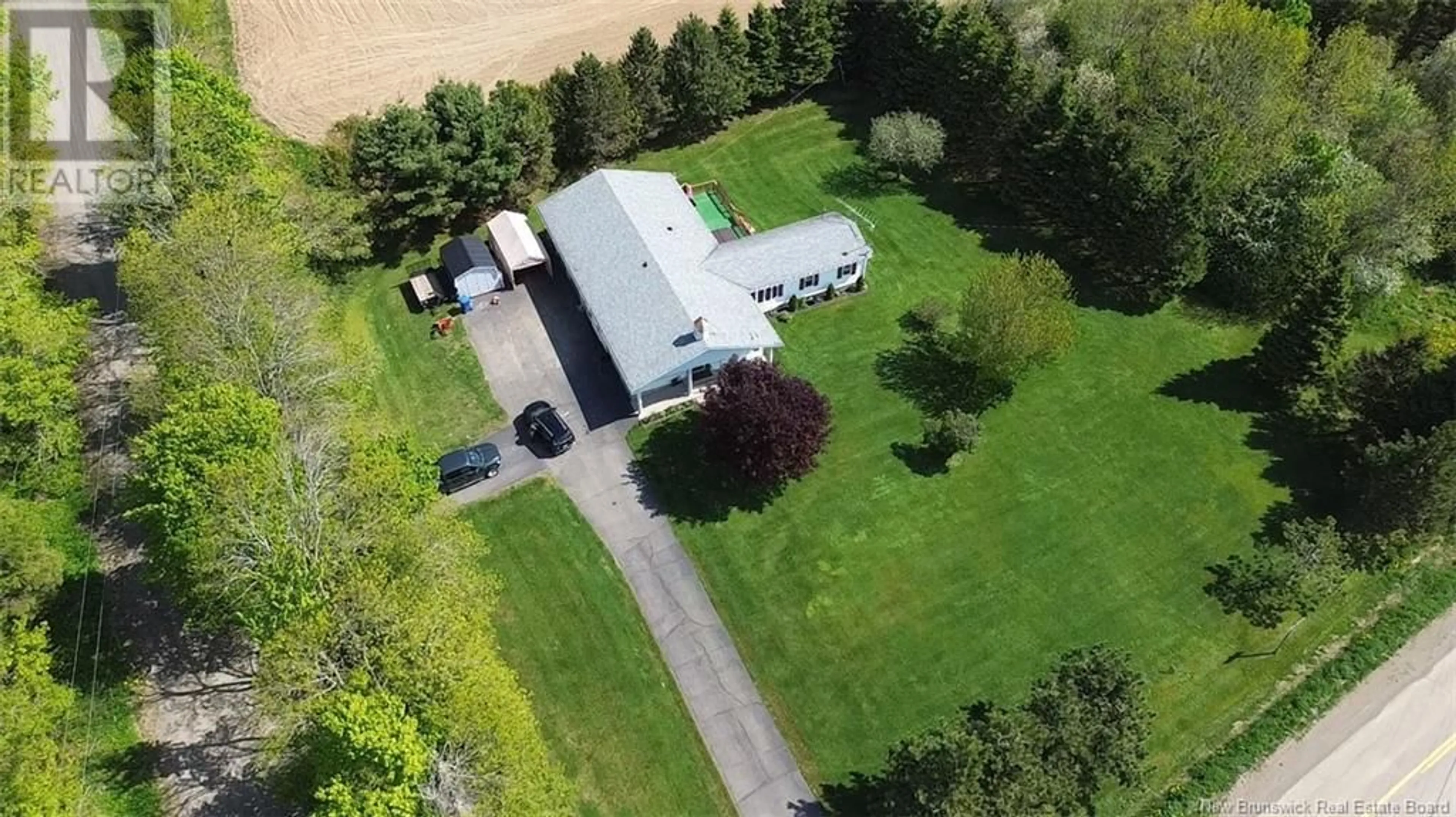 A pic from outside/outdoor area/front of a property/back of a property/a pic from drone, unknown for 1170 555 ROUTE, Richmond Settlement New Brunswick E7M4Y2