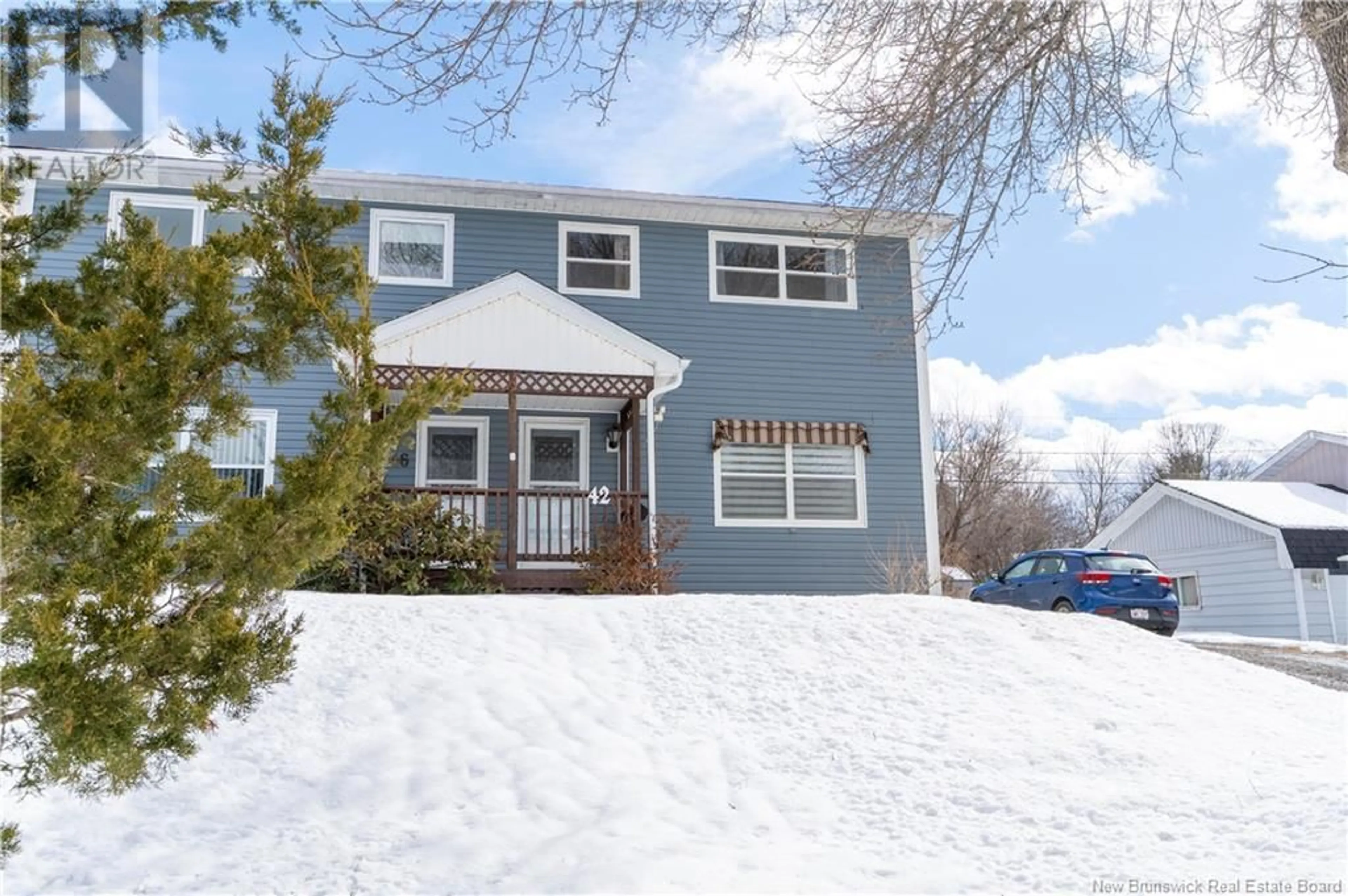 Home with vinyl exterior material, street for 42 NEVILLE STREET, Fredericton New Brunswick E3A4Z5