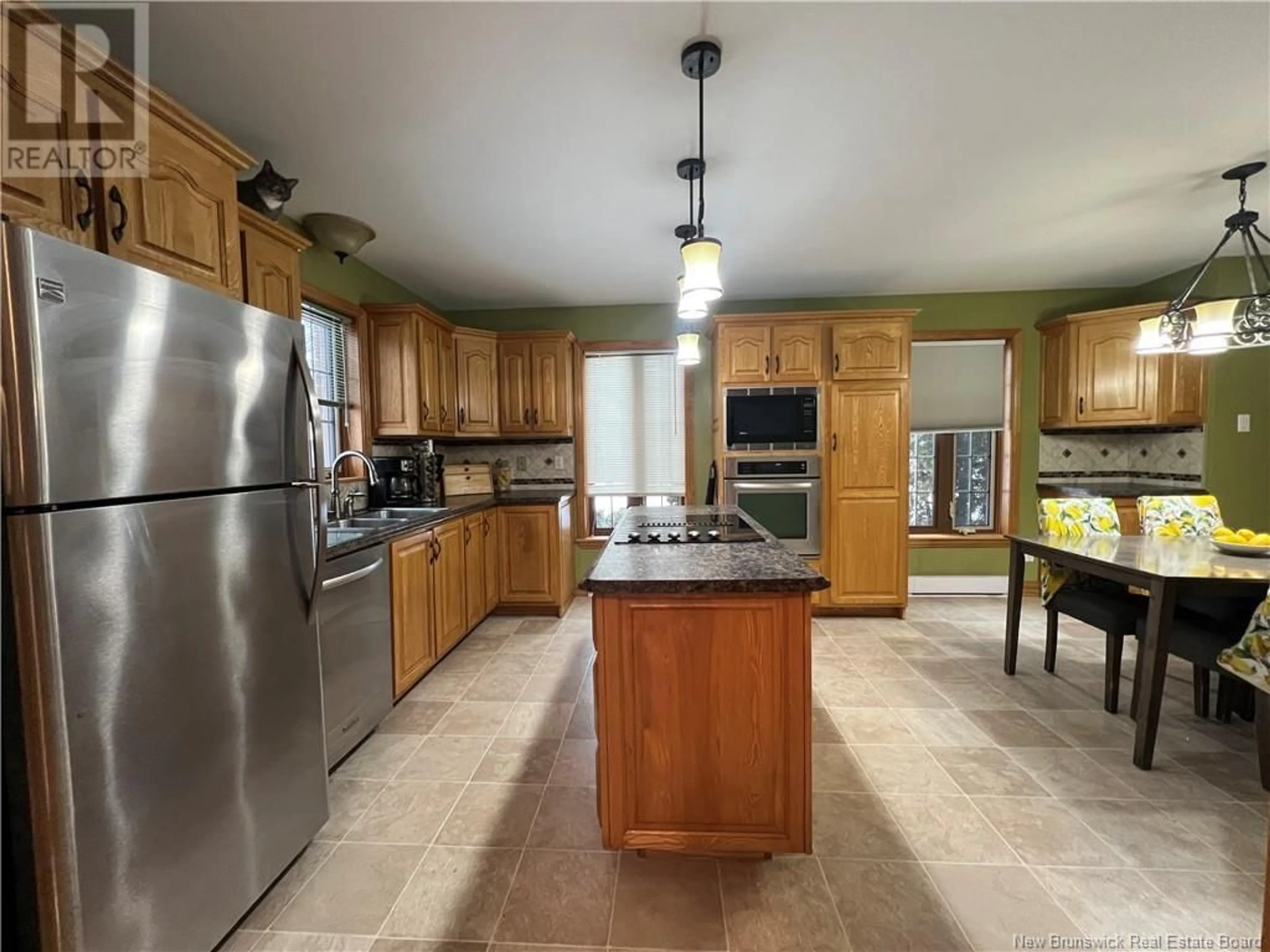 Open concept kitchen, ceramic/tile floor for 24 PAQUIN STREET, Saint-Jacques New Brunswick E7B1V4