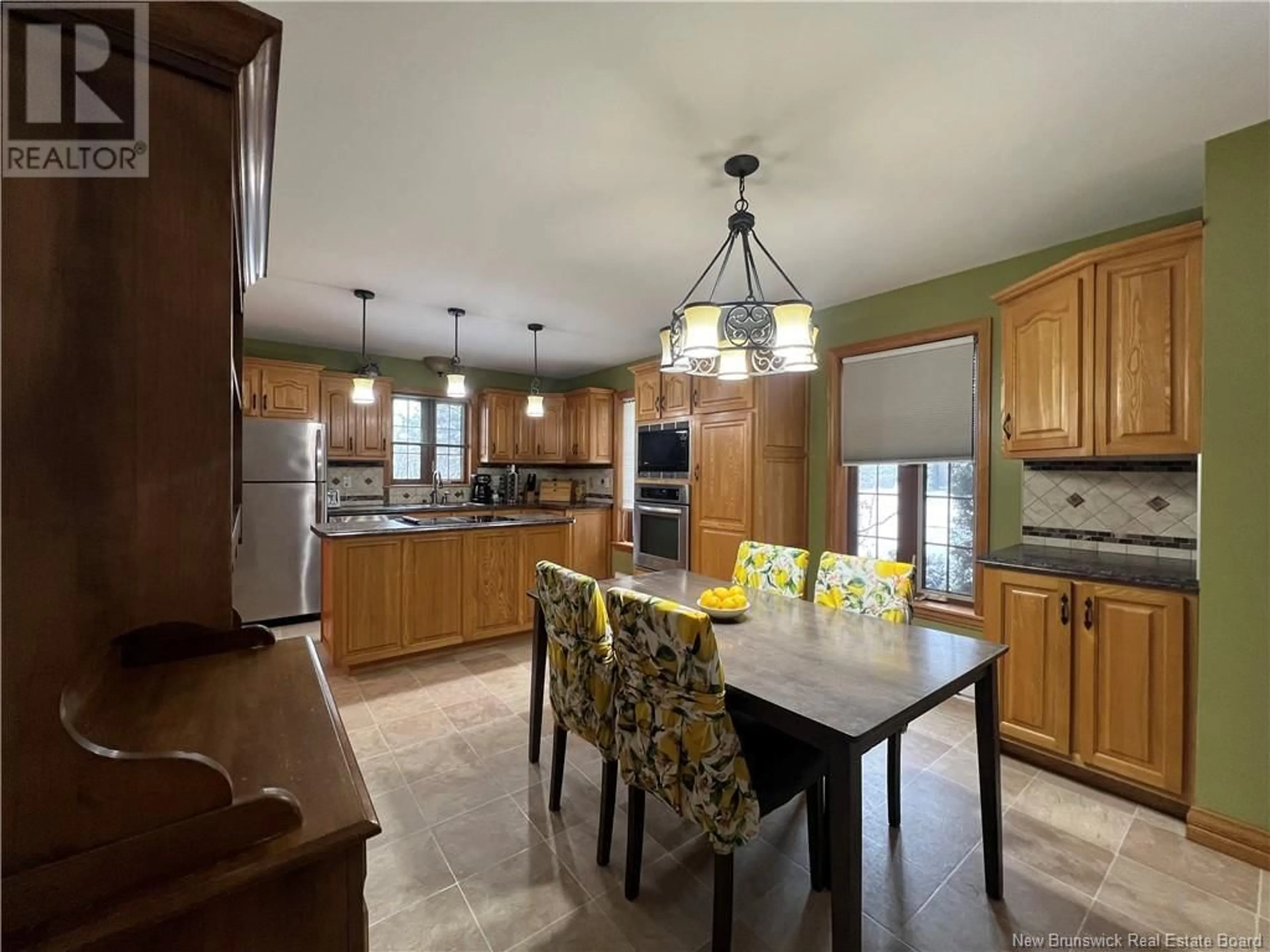 Open concept kitchen, ceramic/tile floor for 24 PAQUIN STREET, Saint-Jacques New Brunswick E7B1V4