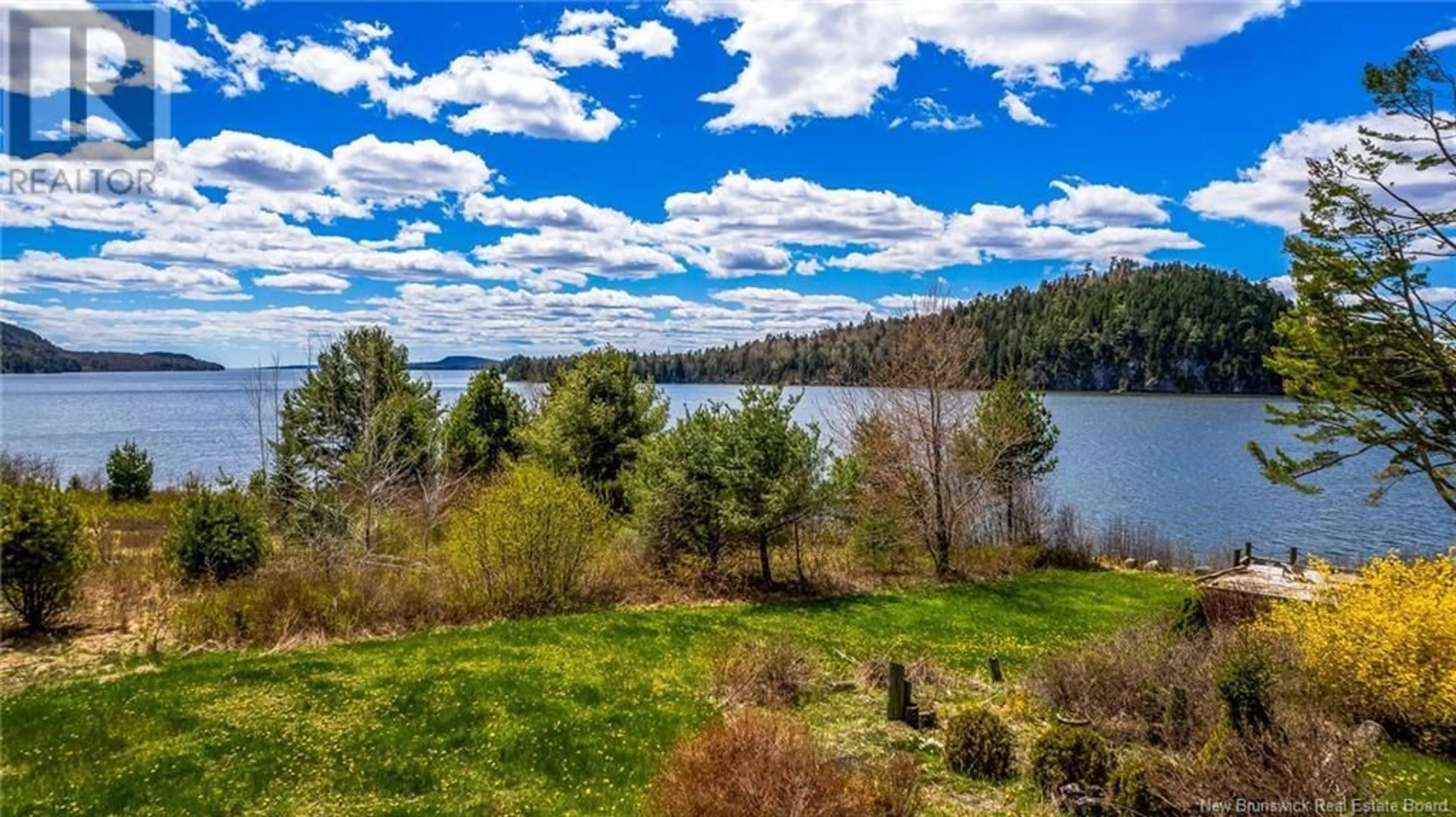 A pic from outside/outdoor area/front of a property/back of a property/a pic from drone, water/lake/river/ocean view for 45 BOARD ROAD EXT., Oak Bay New Brunswick E2L4K4