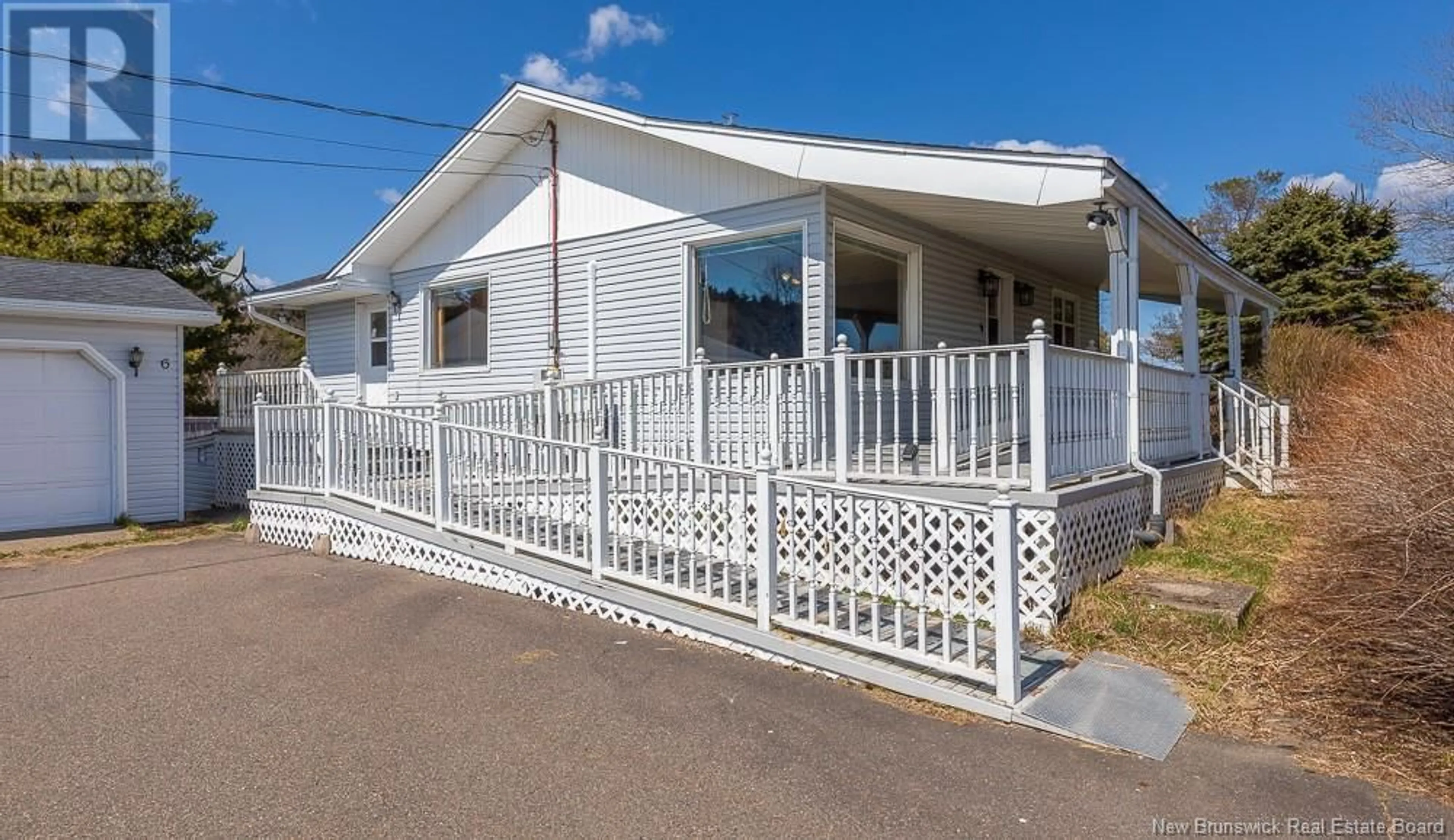 Home with vinyl exterior material, street for 6 MCDONALD LAKE ROAD, Garnett Settlement New Brunswick E2S1W3