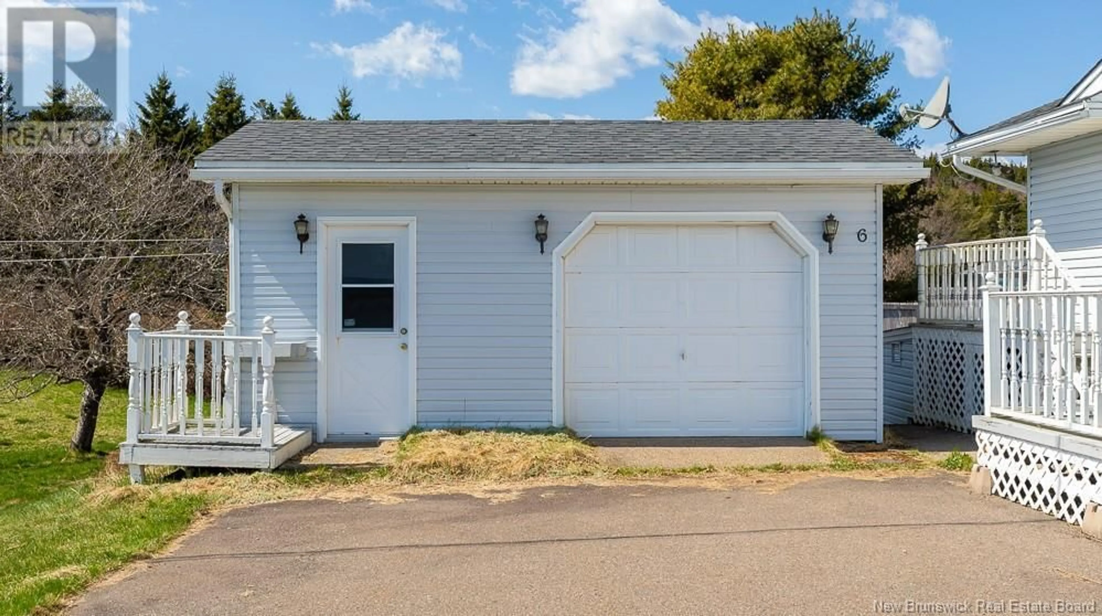 Home with vinyl exterior material, street for 6 MCDONALD LAKE ROAD, Garnett Settlement New Brunswick E2S1W3