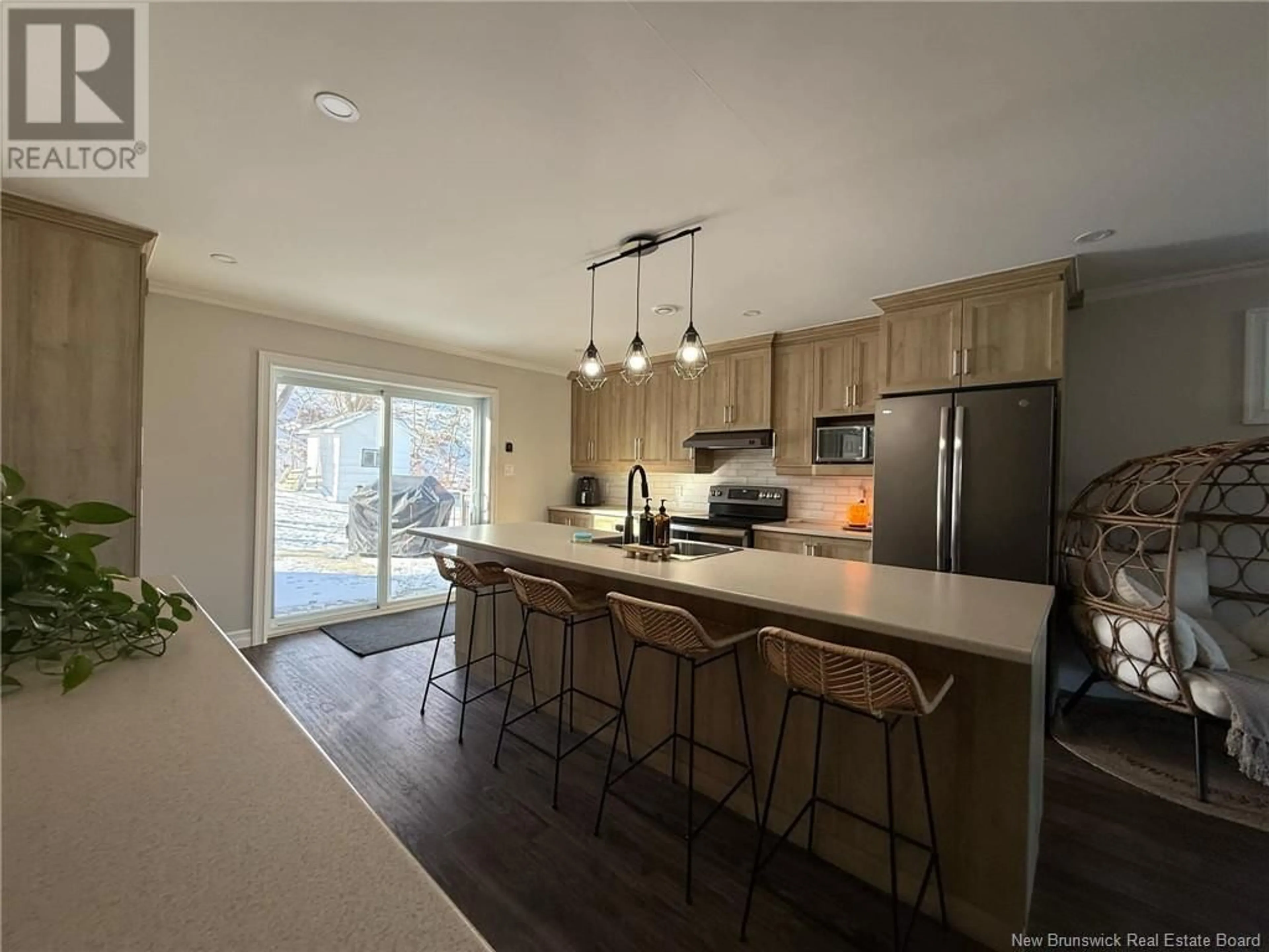 Open concept kitchen, wood/laminate floor for 88 ARRAN STREET, Campbellton New Brunswick E3N1L8