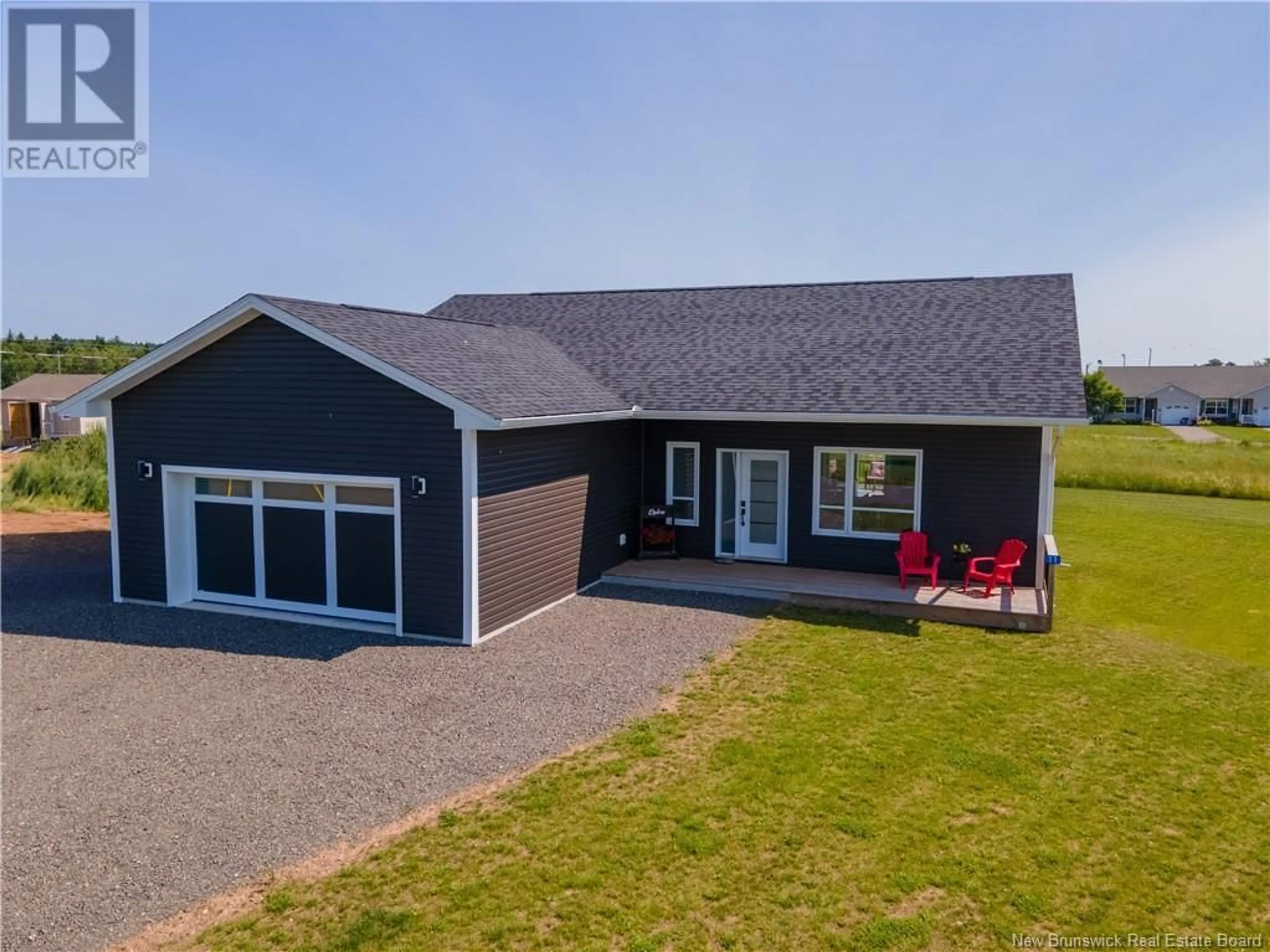 A pic from outside/outdoor area/front of a property/back of a property/a pic from drone, water/lake/river/ocean view for 11 RIVERSIDE DRIVE, Petitcodiac New Brunswick E4Z0K7