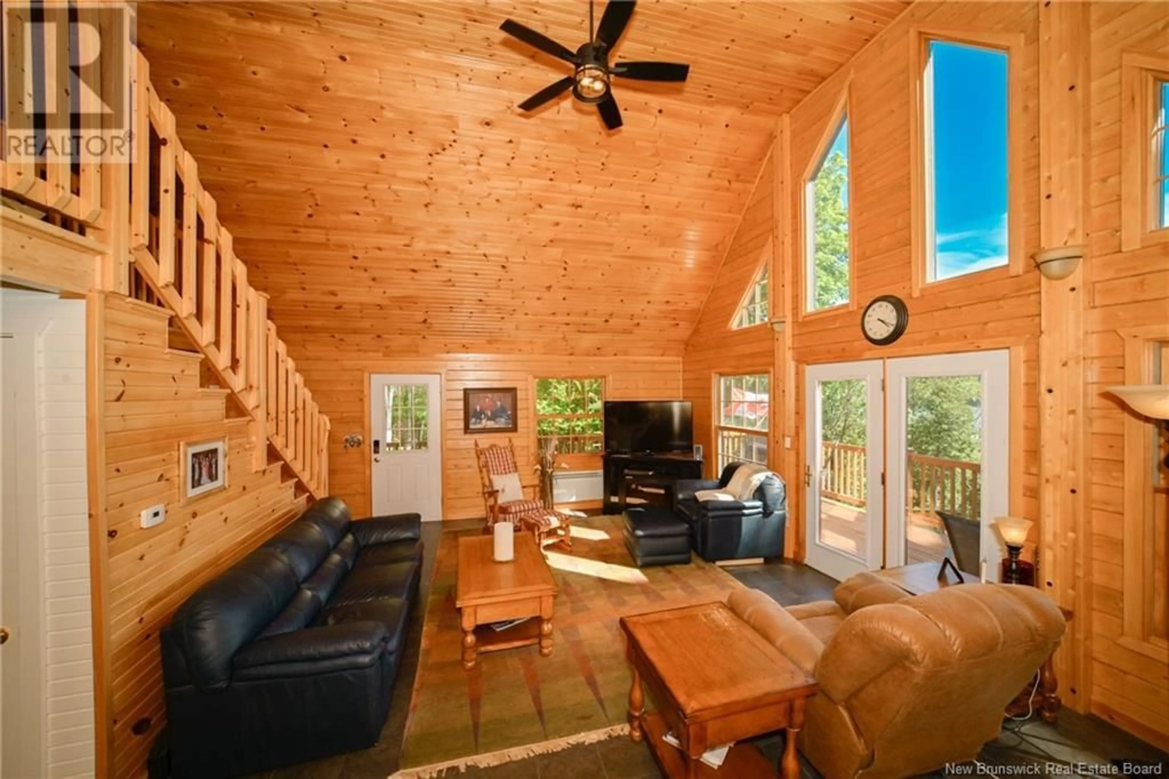 Living room with furniture, wood/laminate floor for 96 WOODMERE DRIVE, Upper Kingsclear New Brunswick E3E1V3