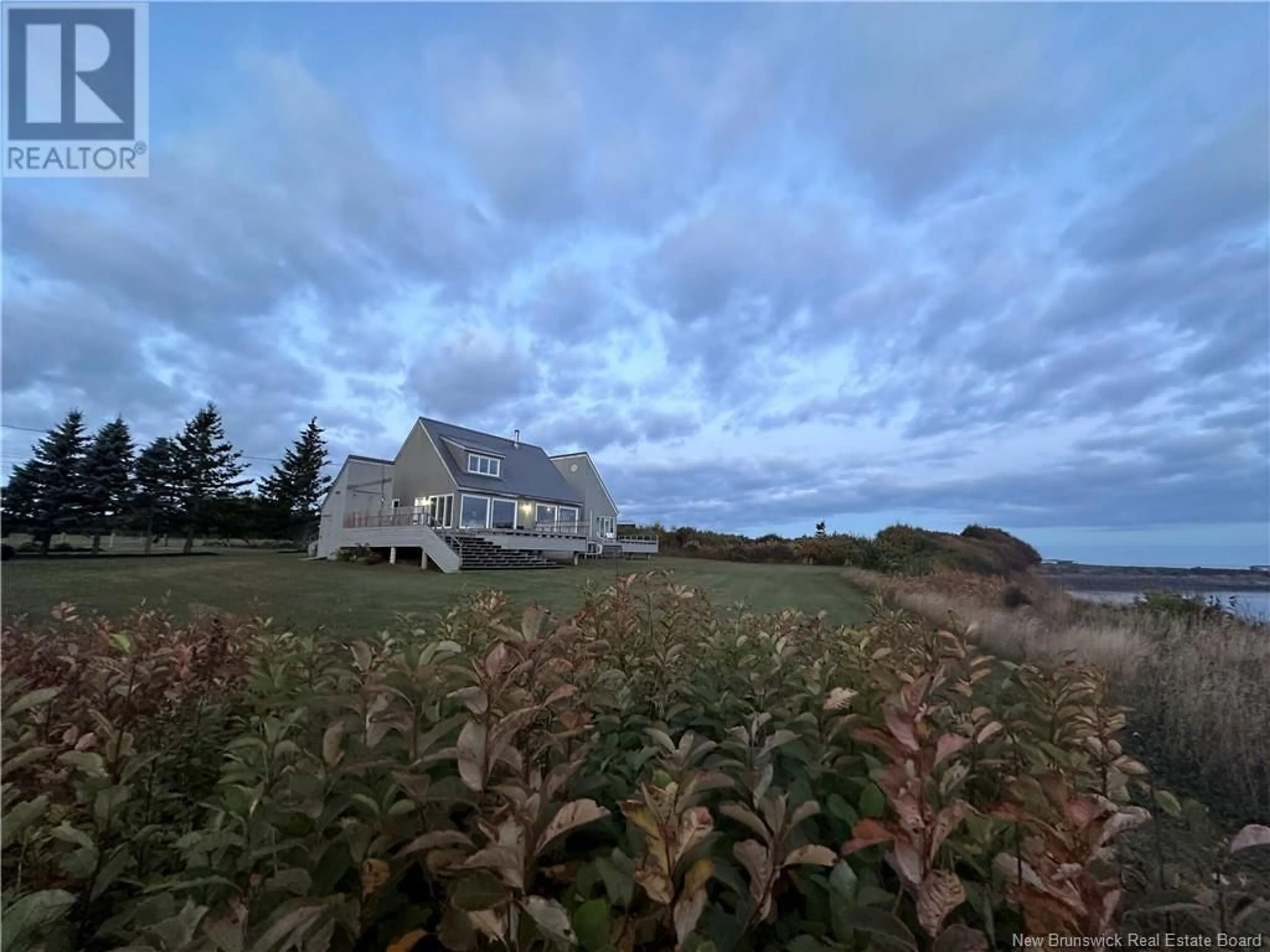 A pic from outside/outdoor area/front of a property/back of a property/a pic from drone, unknown for 1148 DE LA FALAISE AVENUE, Cap-Pelé New Brunswick E4N1P5