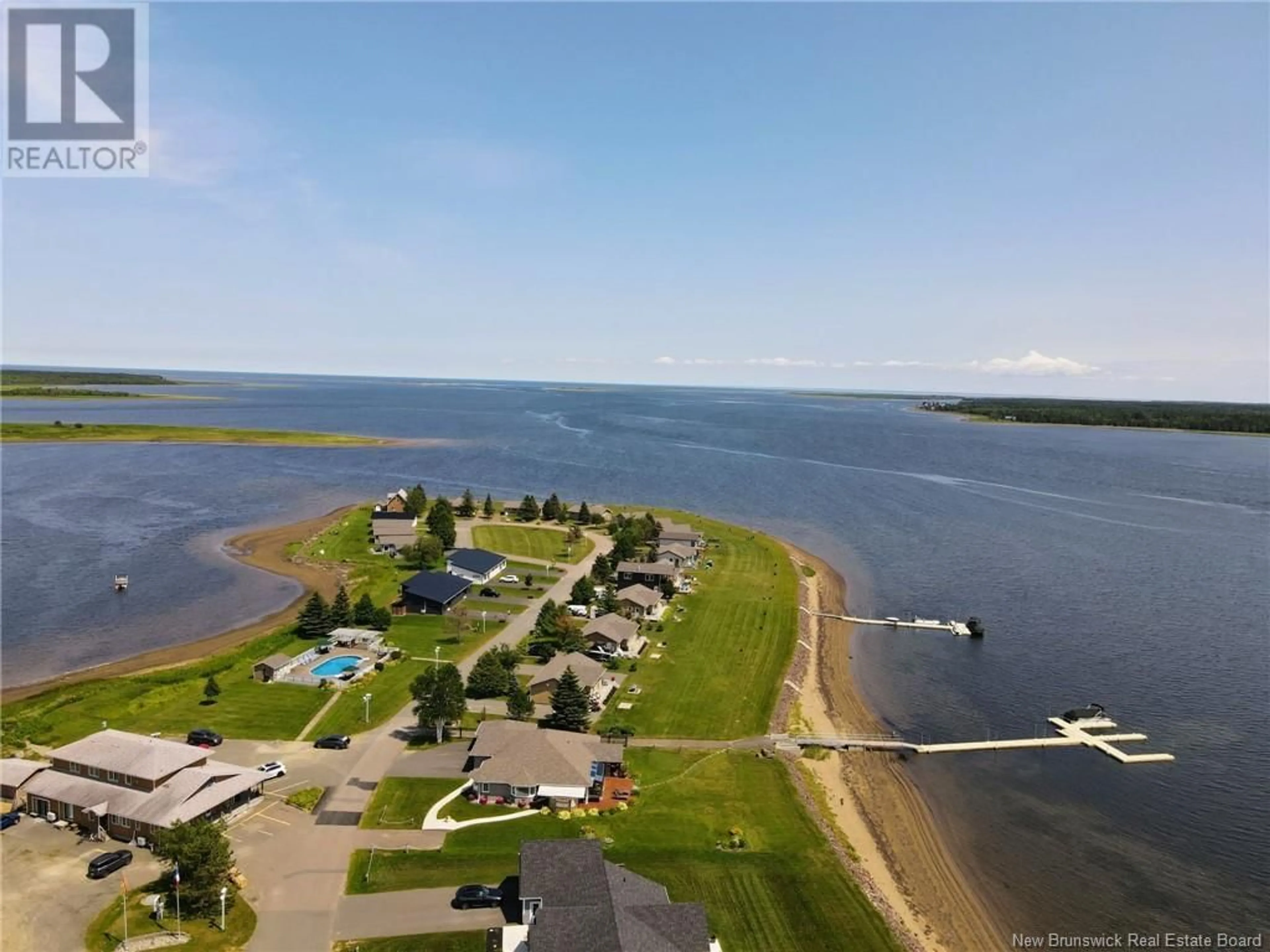 A pic from outside/outdoor area/front of a property/back of a property/a pic from drone, water/lake/river/ocean view for 80 York Street, Richibucto New Brunswick E4W4K2