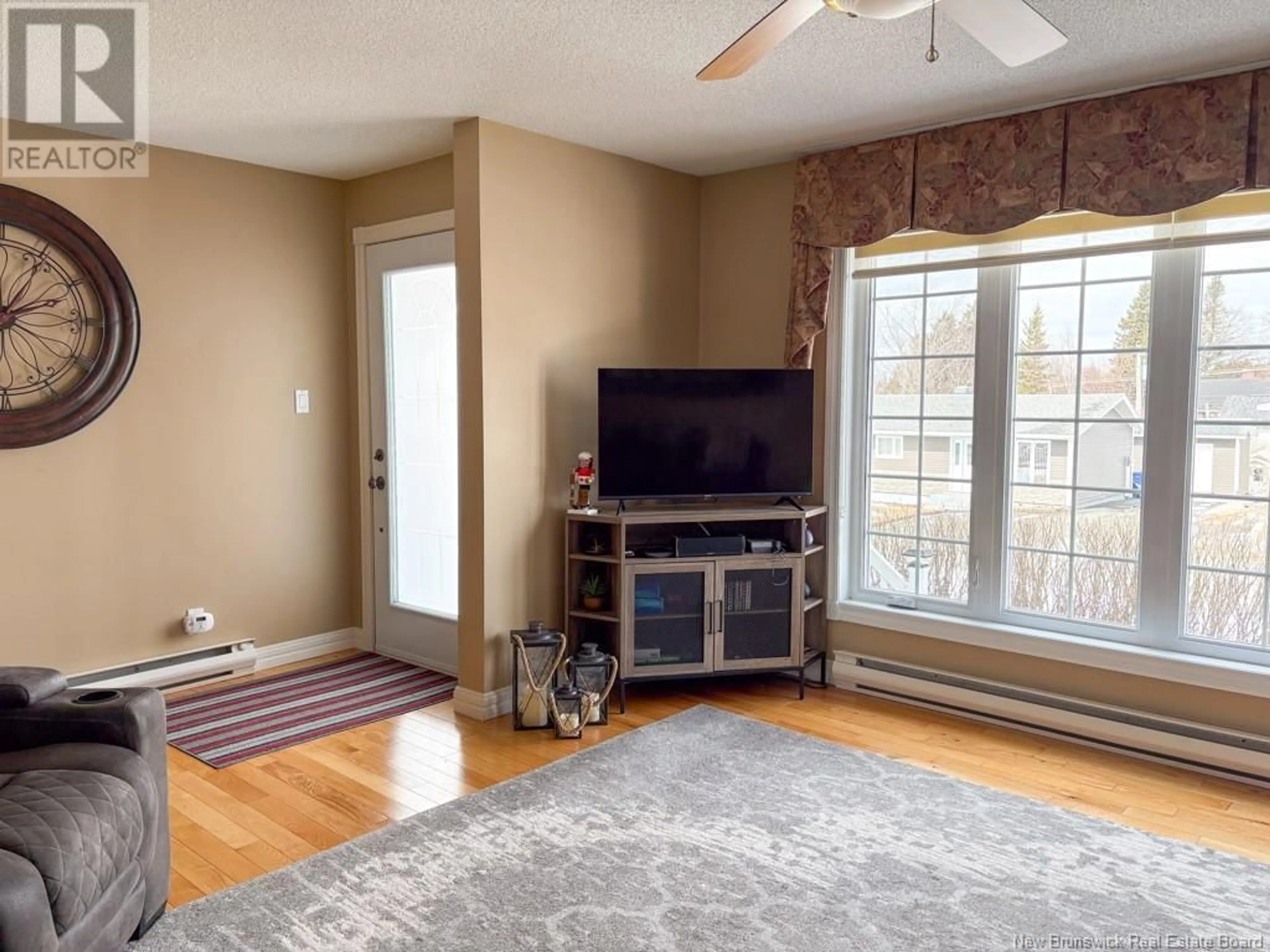 Living room with furniture, unknown for 349 HENNESSY STREET, Bathurst New Brunswick E2A2N8