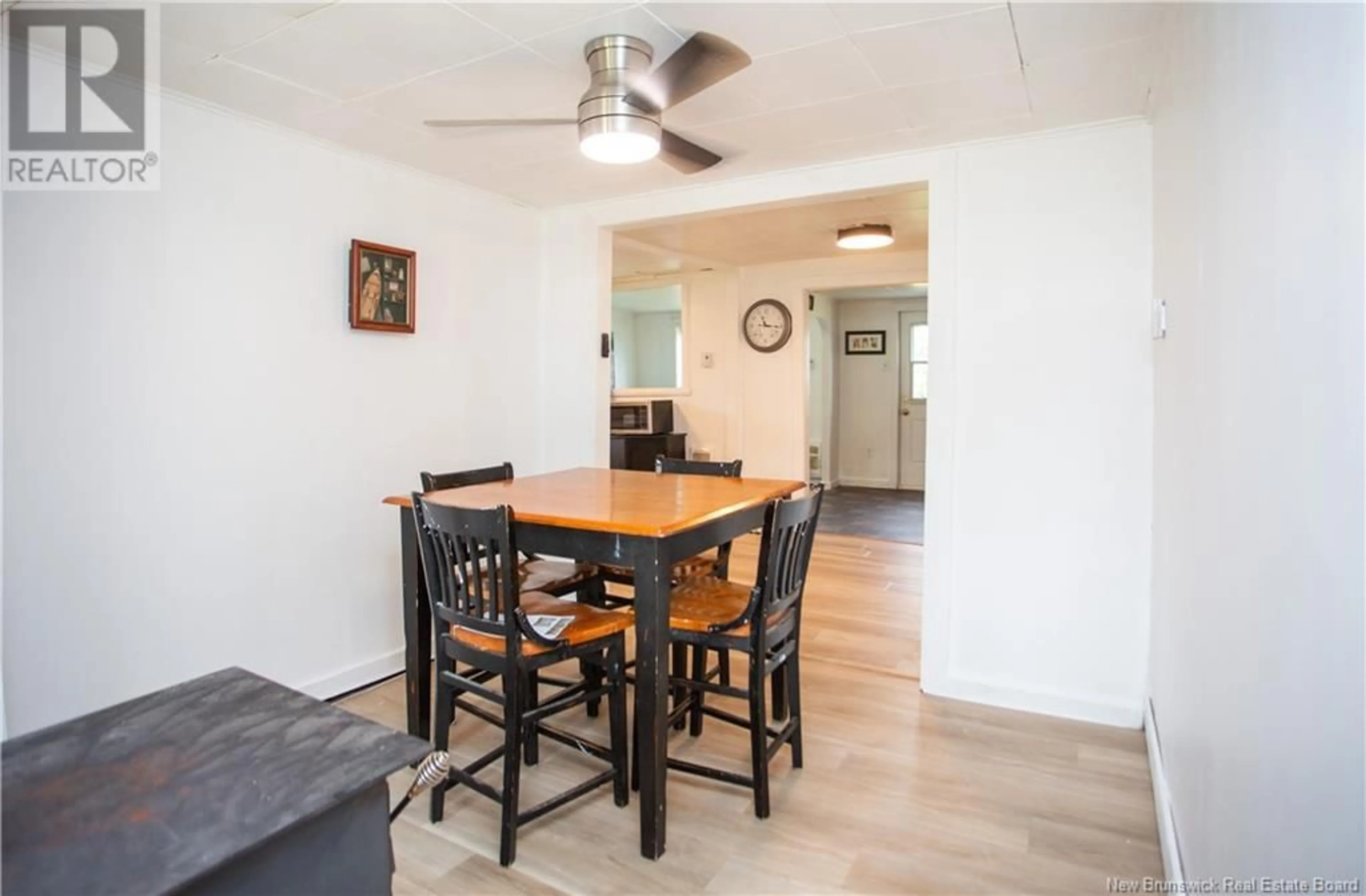 Dining room, wood/laminate floor for 31 PLEASANT STREET, Rogersville New Brunswick E4Y1A1