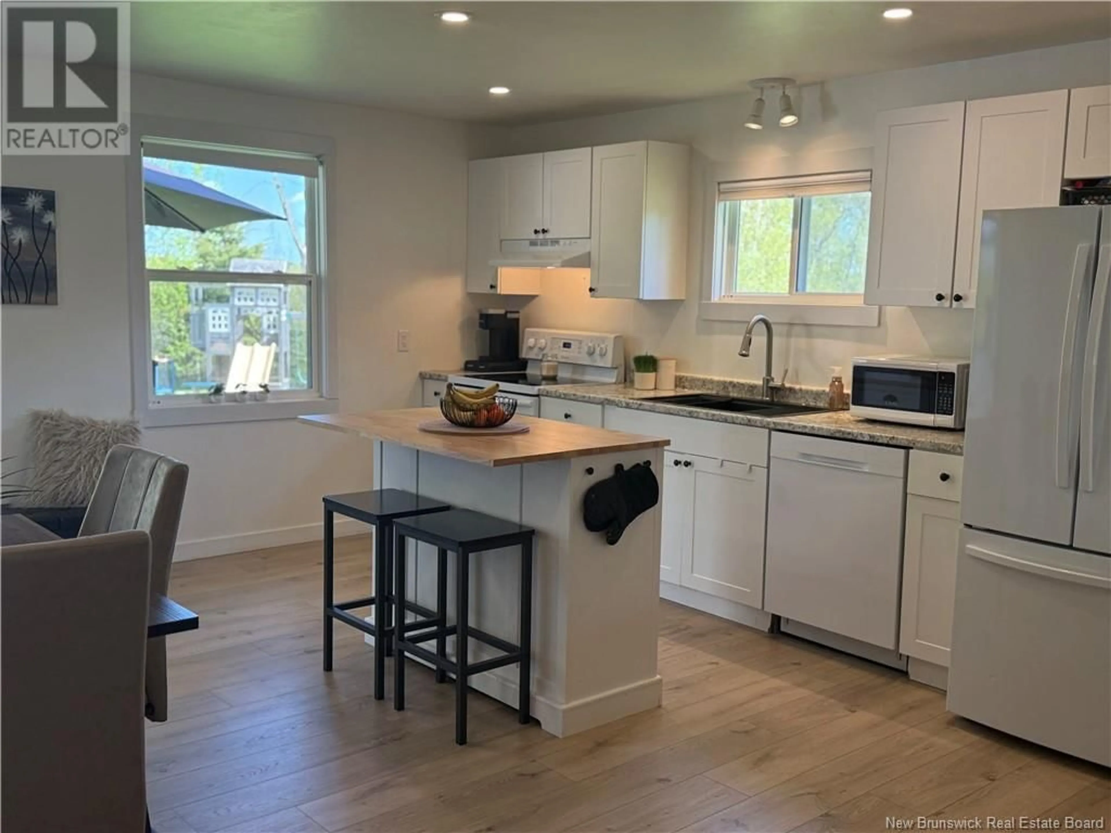 Open concept kitchen, wood/laminate floor for 5282 ROUTE 108, Lower Derby New Brunswick E1V5H7