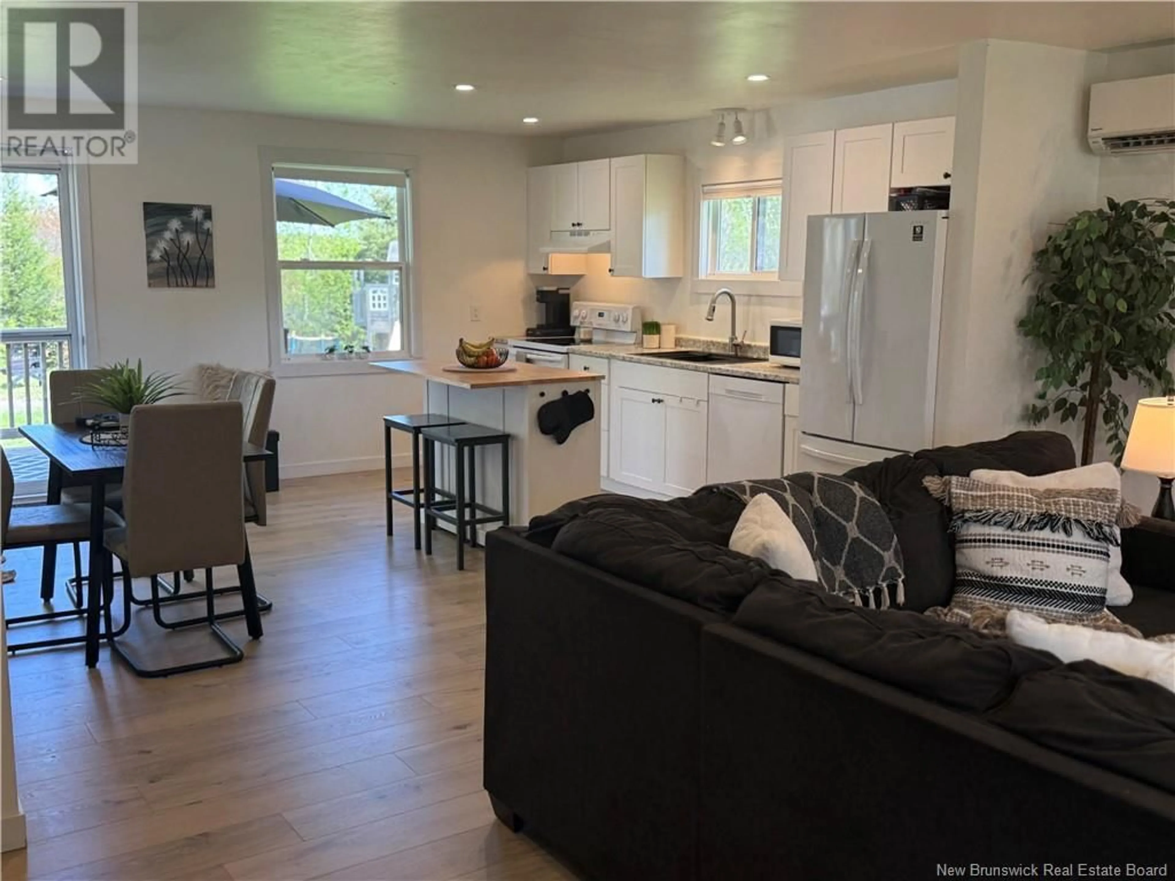 Open concept kitchen, wood/laminate floor for 5282 ROUTE 108, Lower Derby New Brunswick E1V5H7