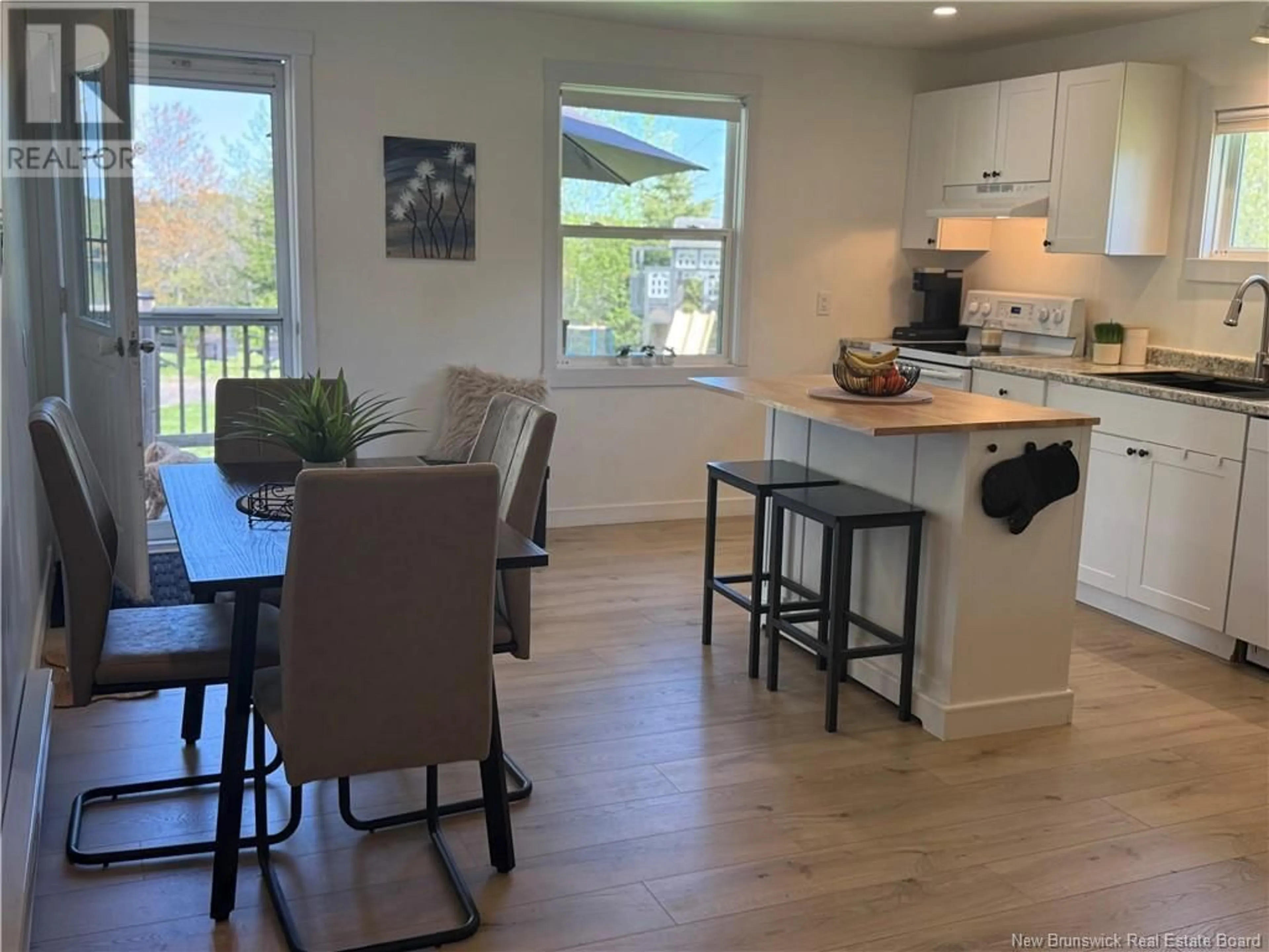 Open concept kitchen, wood/laminate floor for 5282 ROUTE 108, Lower Derby New Brunswick E1V5H7
