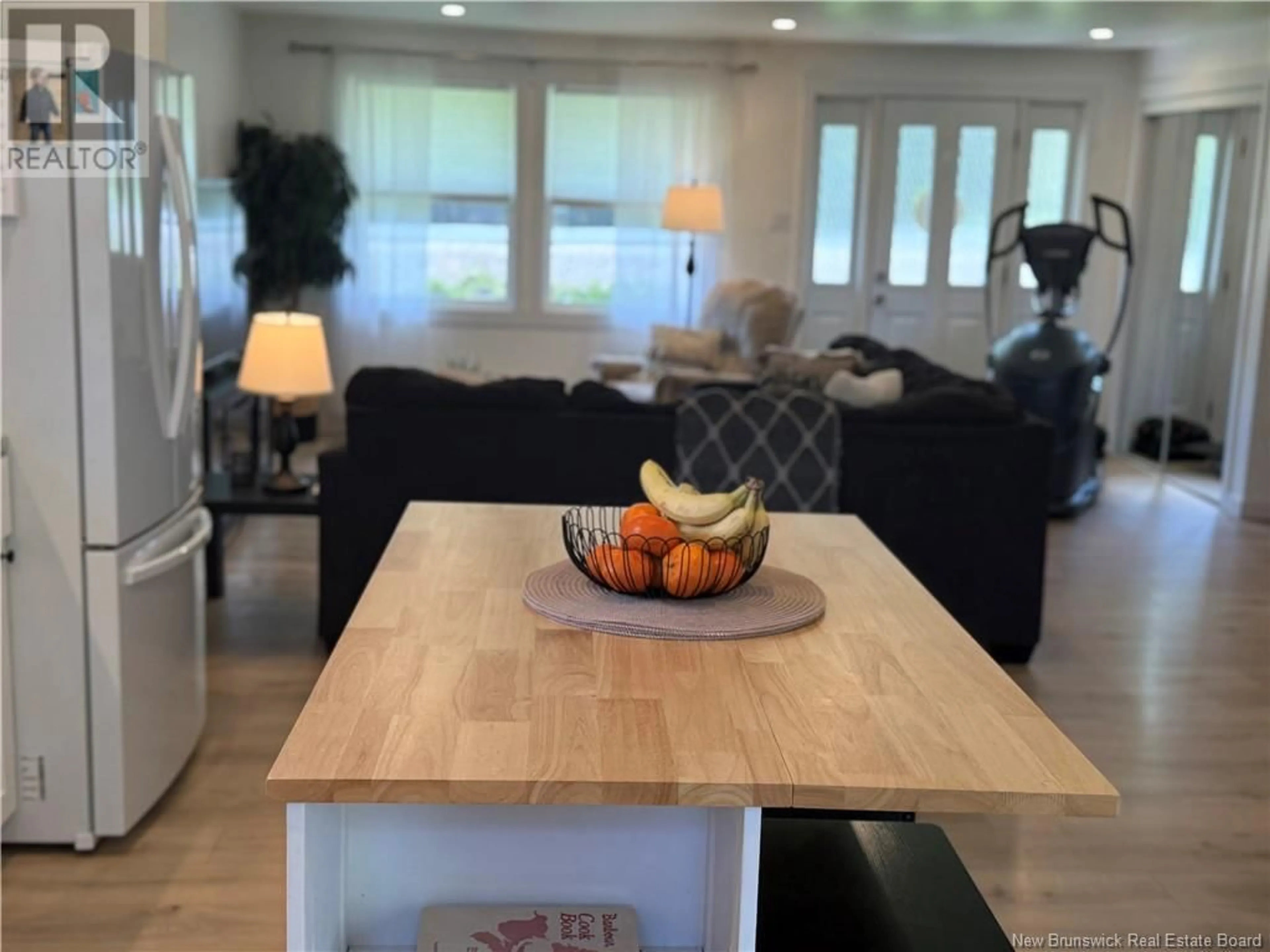 Living room with furniture, wood/laminate floor for 5282 ROUTE 108, Lower Derby New Brunswick E1V5H7