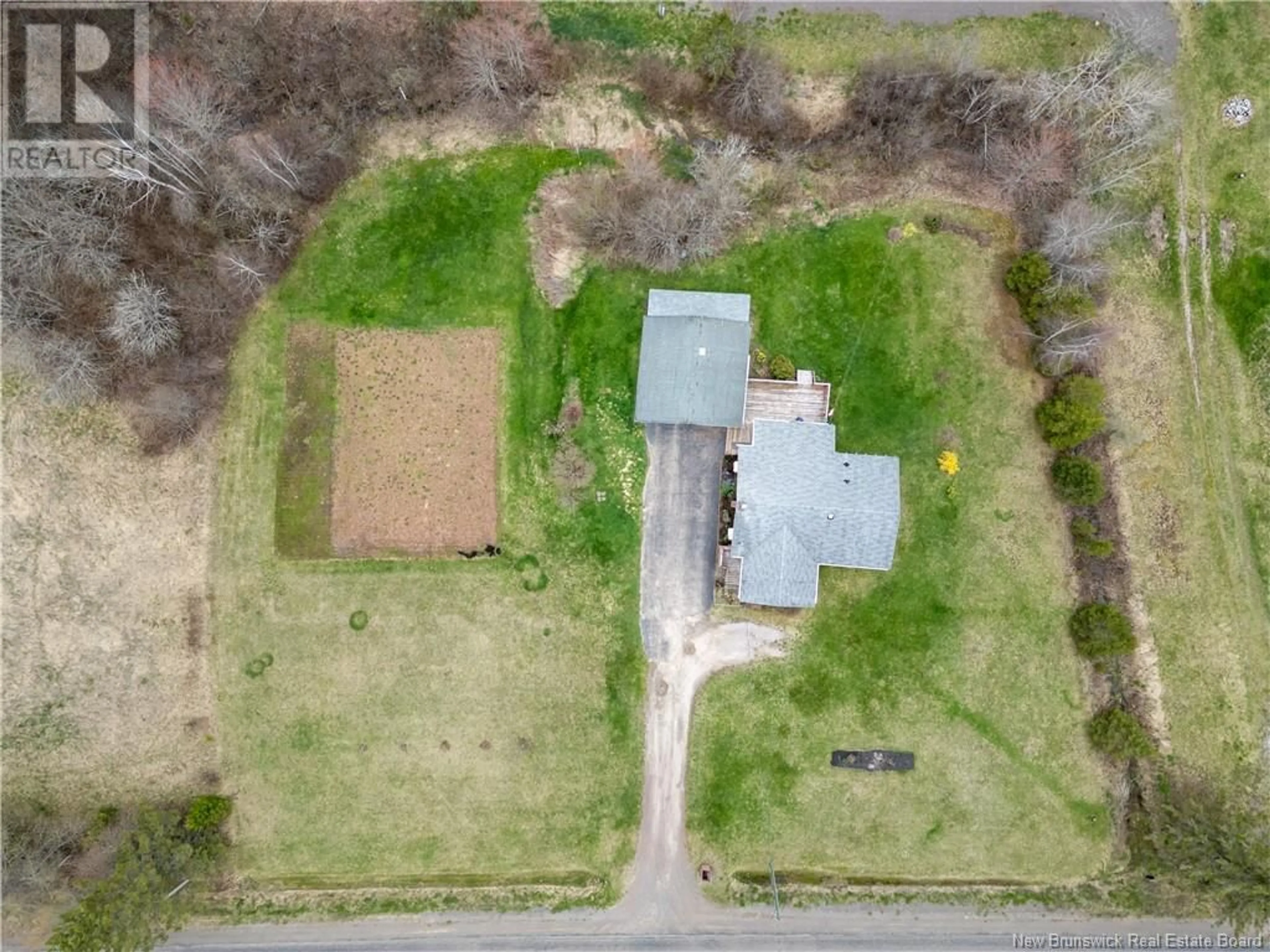 A pic from outside/outdoor area/front of a property/back of a property/a pic from drone, street for 3632 ROUTE 112, Second North River New Brunswick E4J2V4