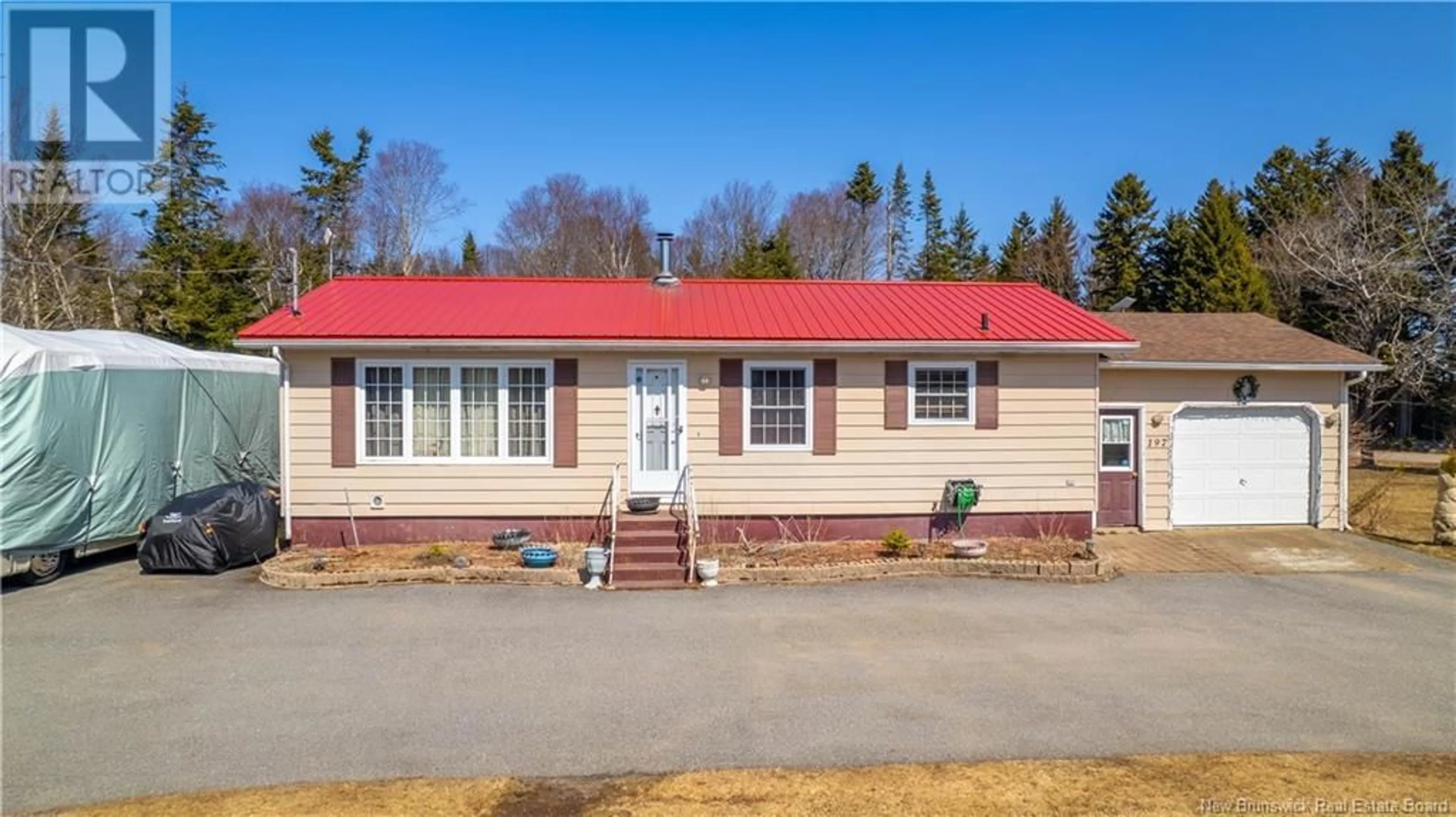 Home with vinyl exterior material, street for 197 MUNROE ROAD, Pennfield New Brunswick E5H2B3
