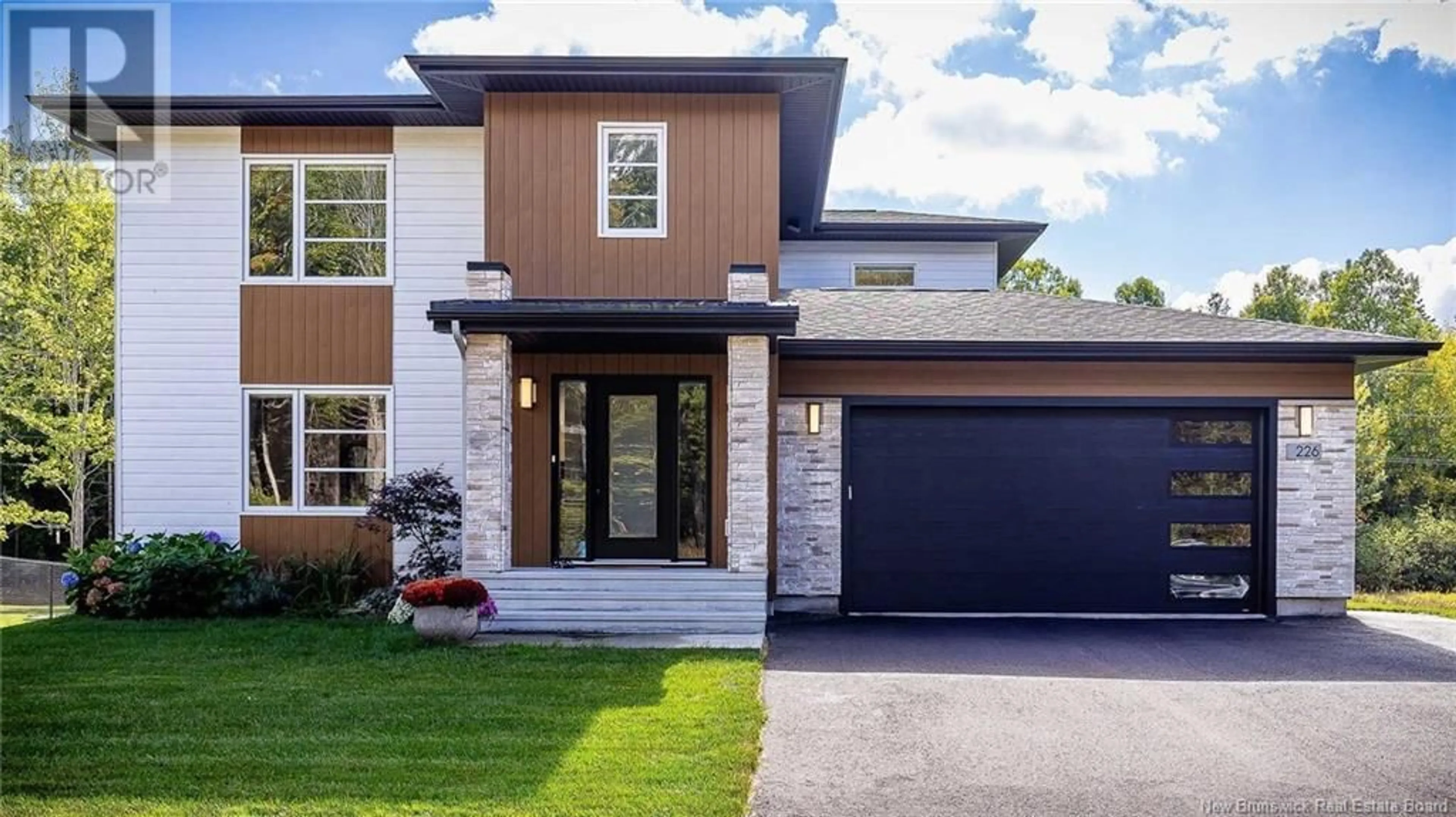 Home with brick exterior material, street for 226 LEOPOLD F. BELLIVEAU DRIVE, Moncton New Brunswick E1A9N9