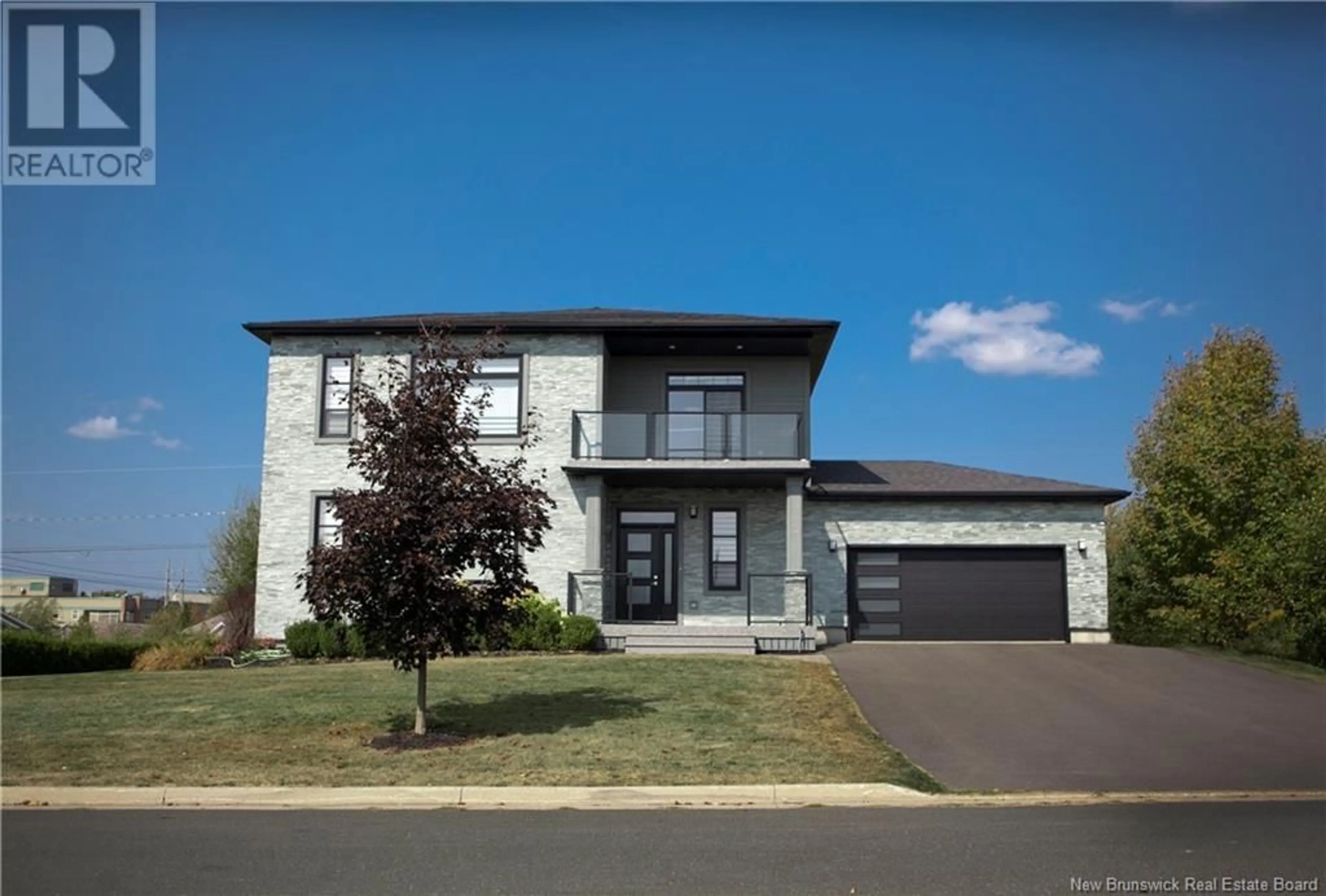 Home with vinyl exterior material, street for 44 Bicentennial Drive, Woodstock New Brunswick E7M6A7