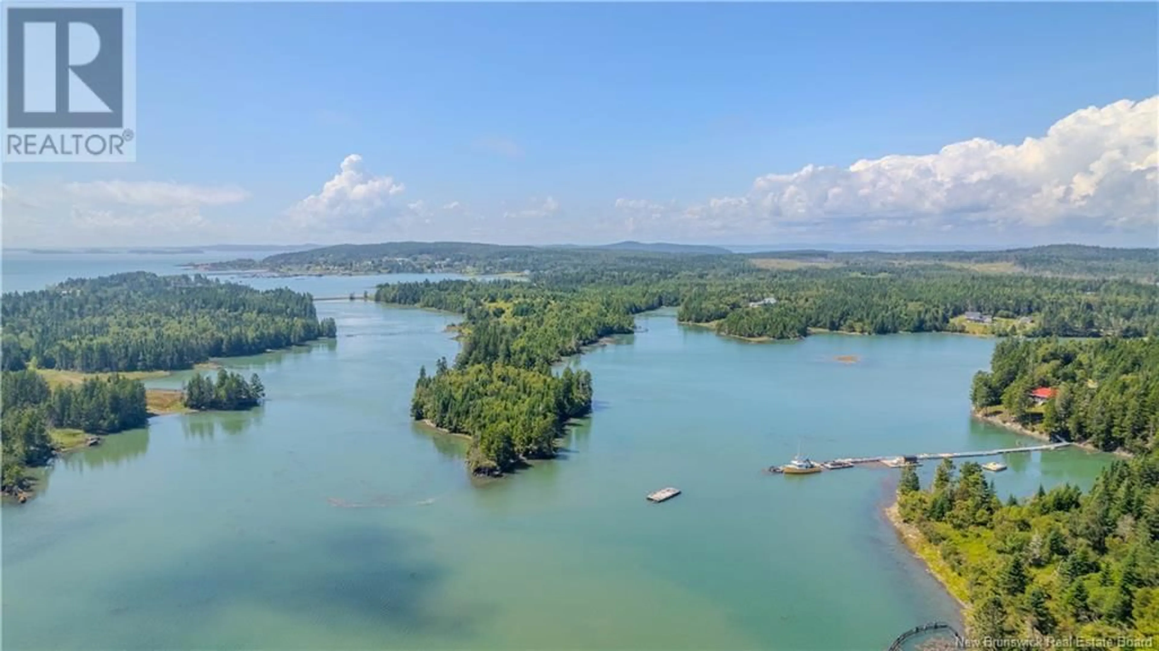 A pic from outside/outdoor area/front of a property/back of a property/a pic from drone, water/lake/river/ocean view for 768 172 ROUTE, Back Bay New Brunswick E5C1W2