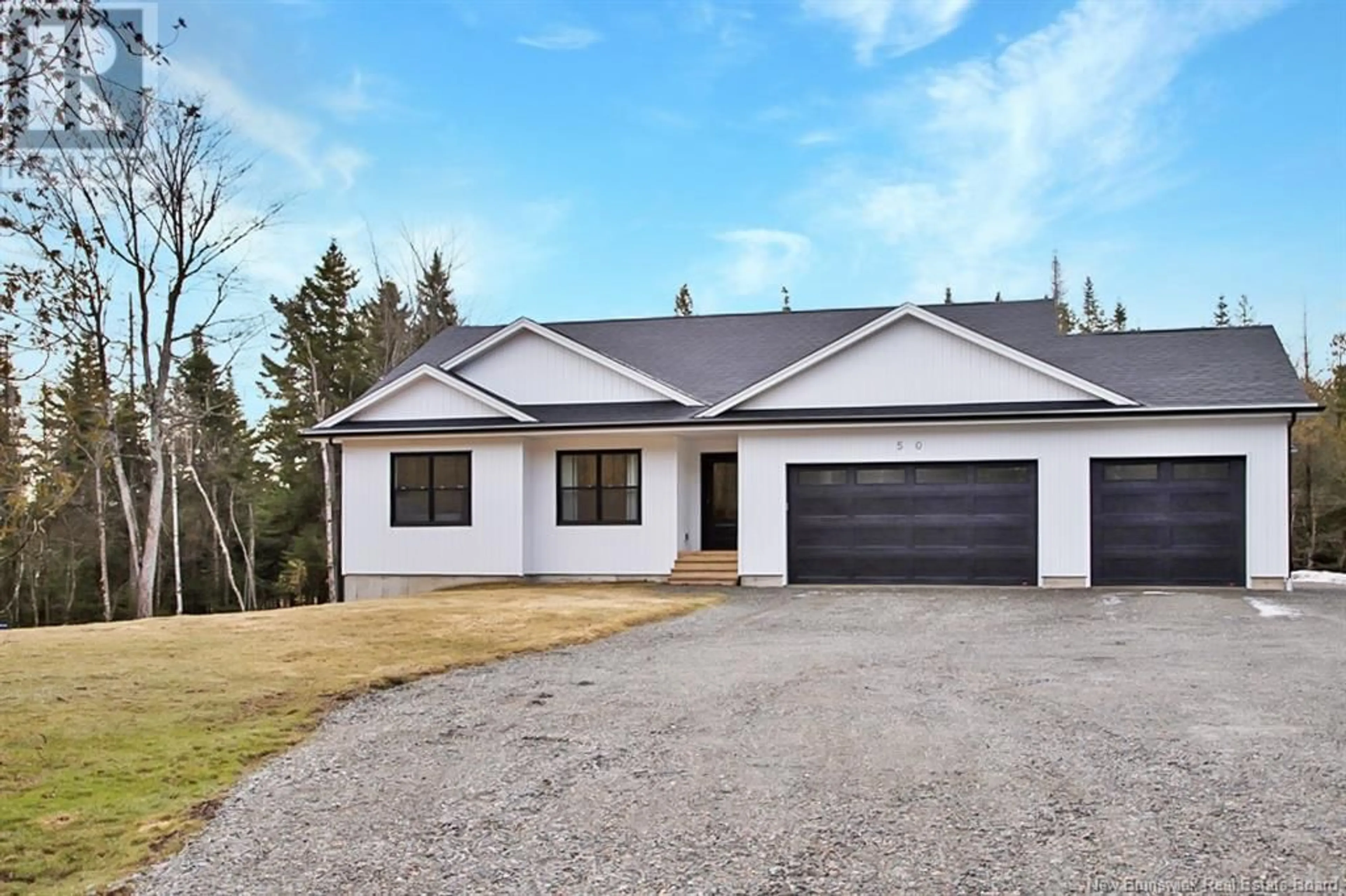 A pic from outside/outdoor area/front of a property/back of a property/a pic from drone, unknown for 50 CHAMBERLAIN ROAD, Quispamsis New Brunswick E2G1C1